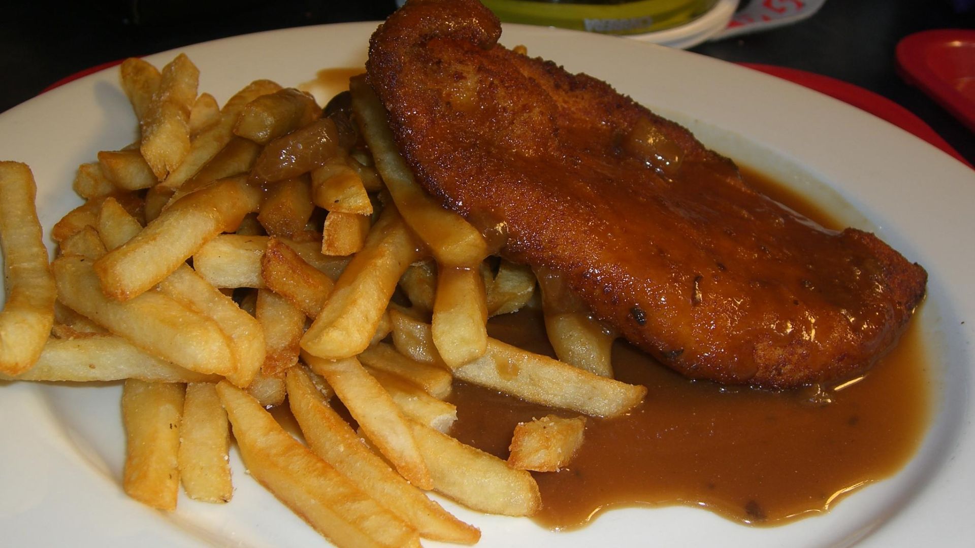 File:Chicken schnitzel and chips with jaeger gravy.jpg