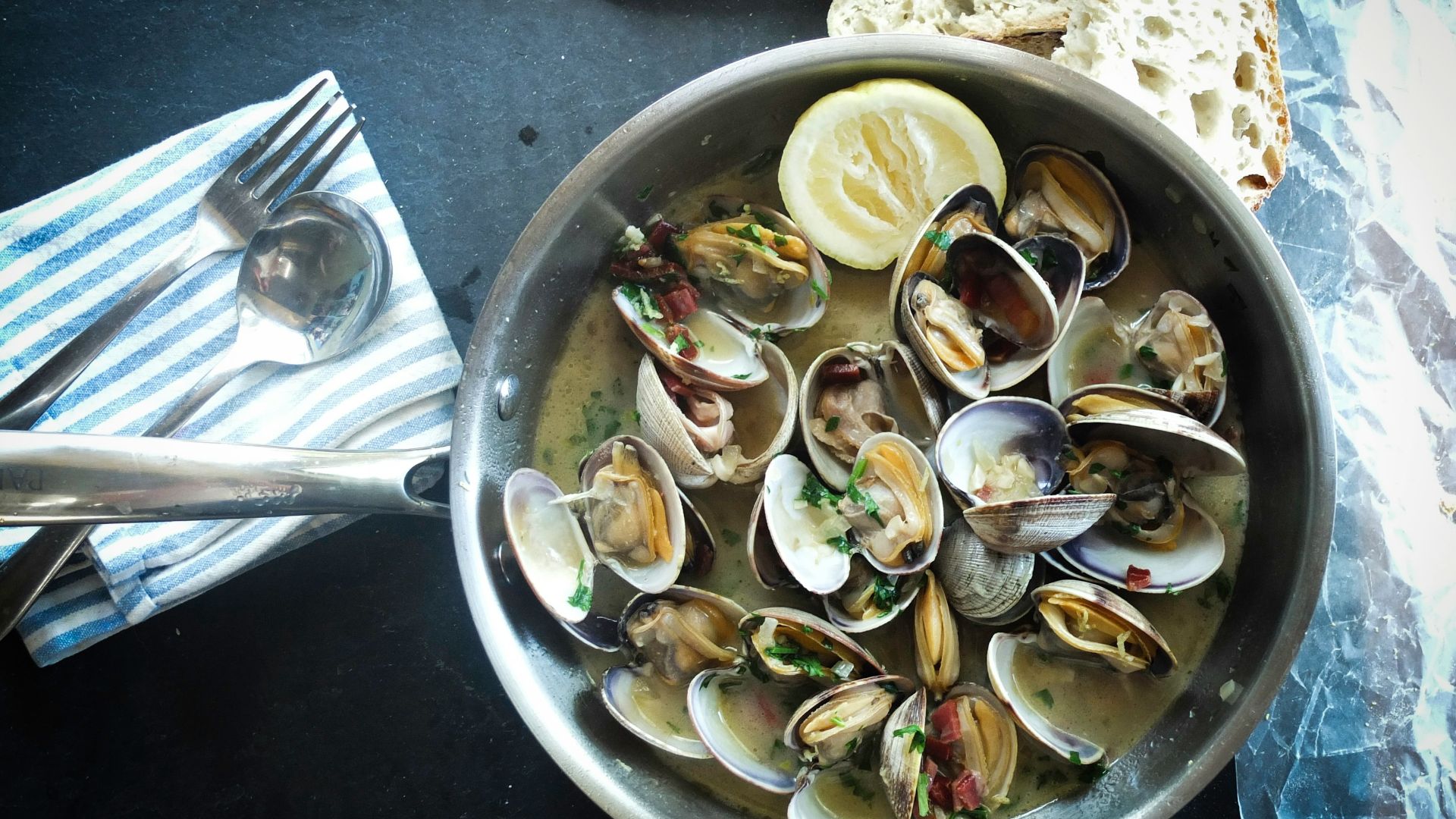round silver steel bowl with scallops