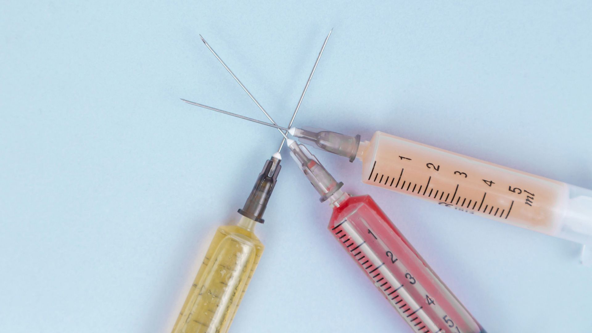 clear glass tube with brown liquid