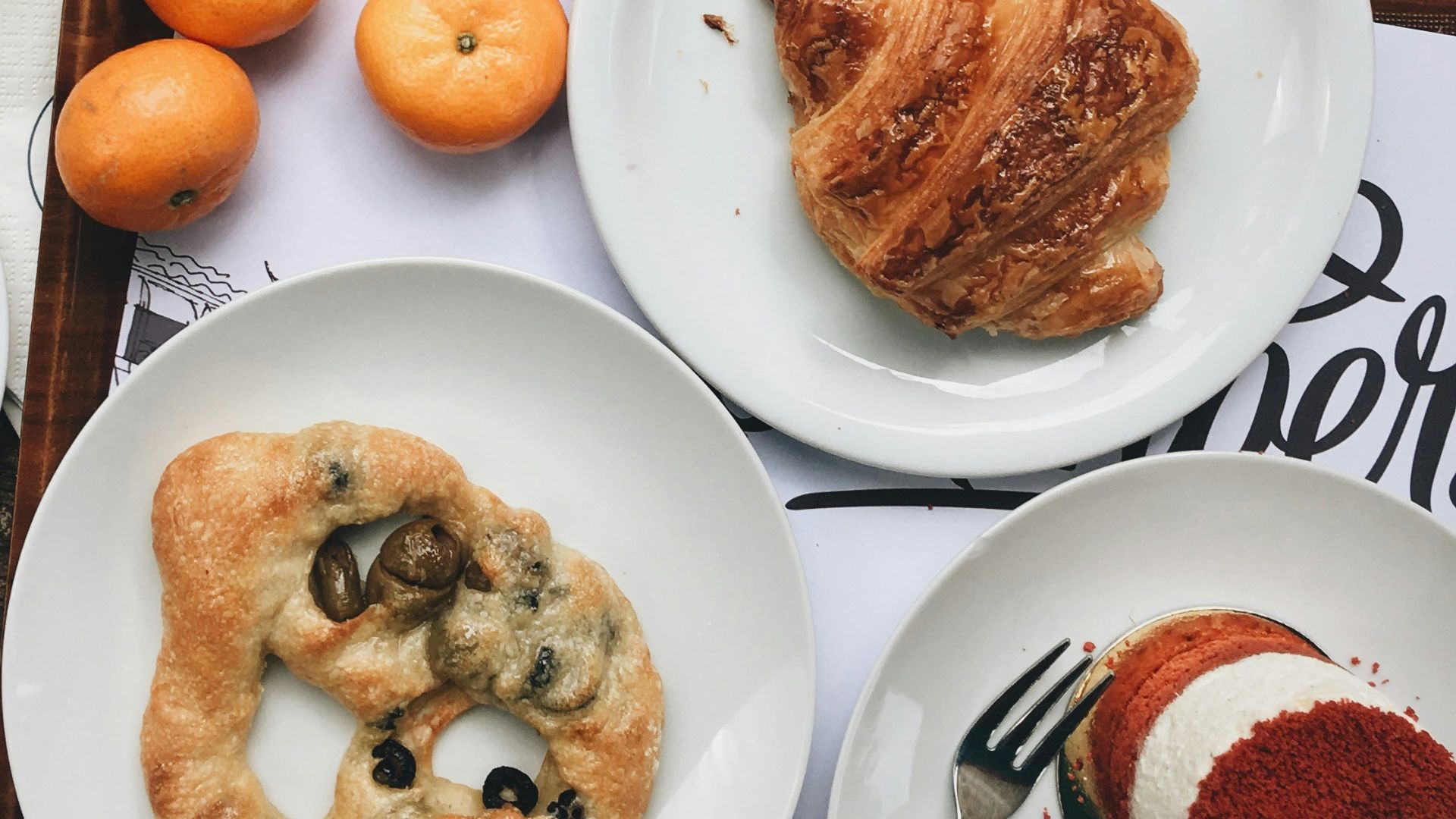 assorted bread with coffee and drinks