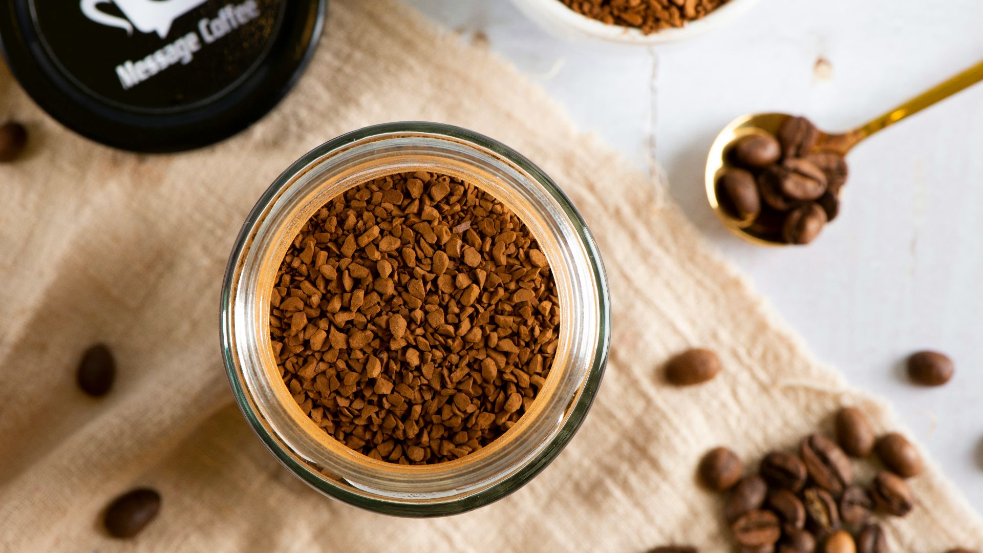 a bowl of cereal with milk and a spoon