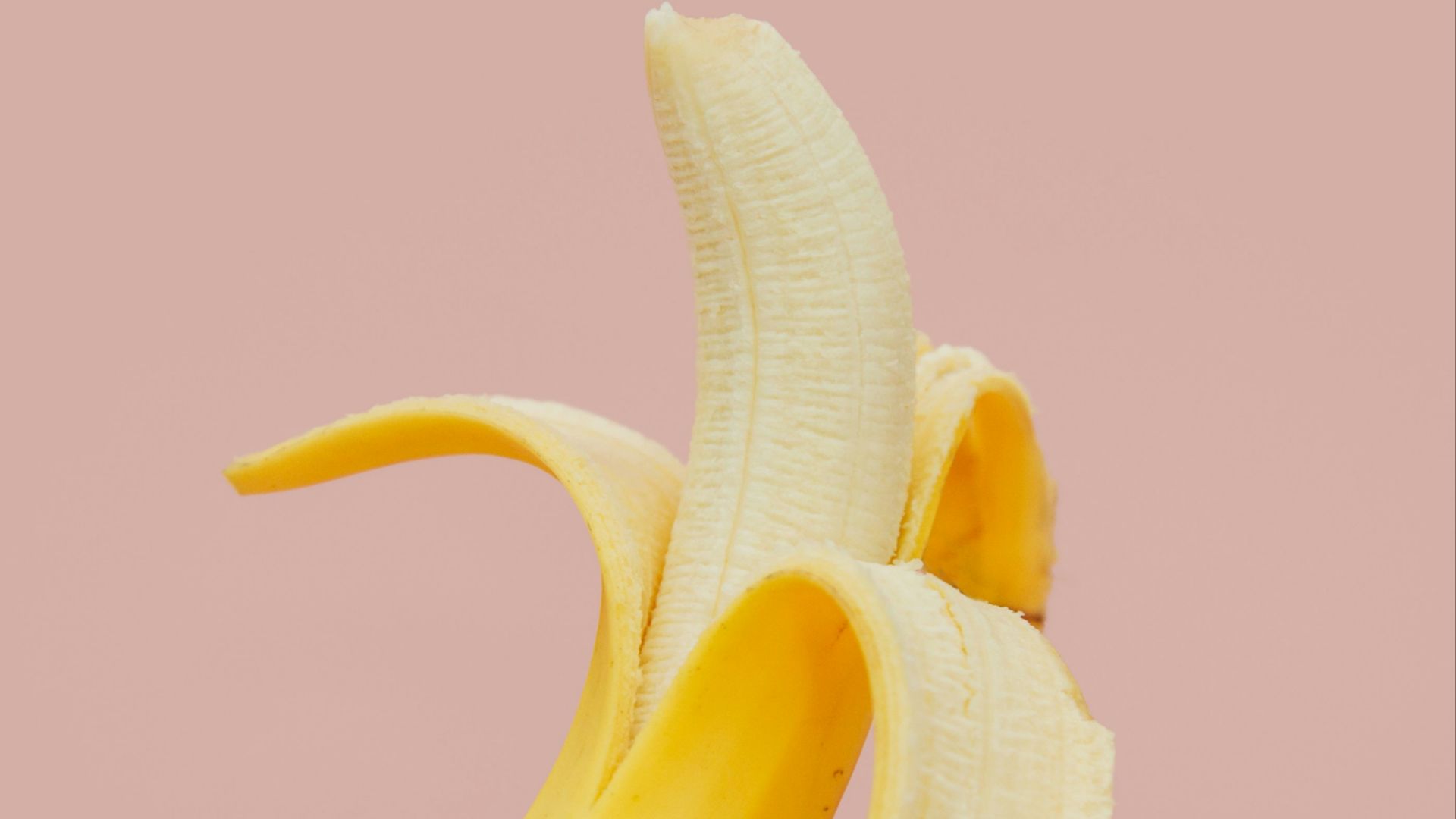 half peeled banana fruit
