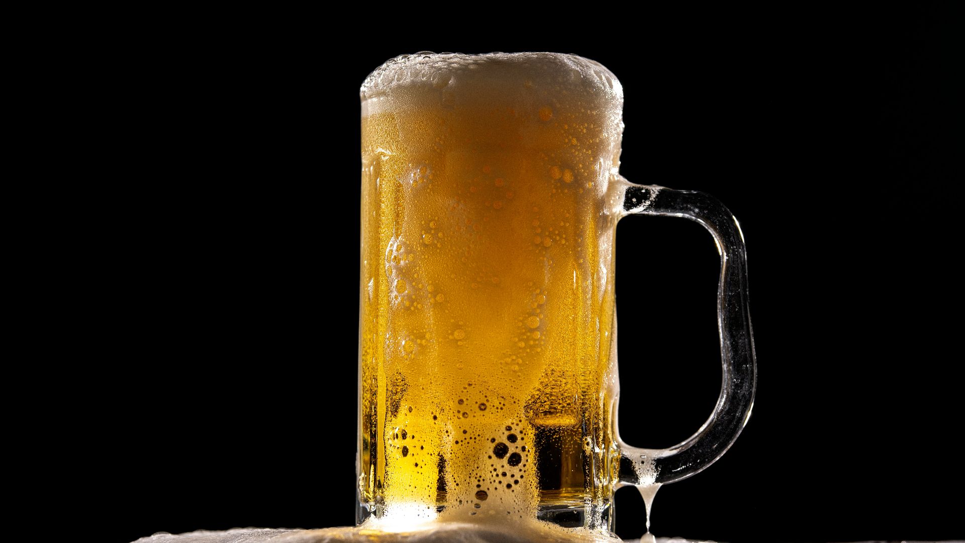 clear glass beer mug with beer