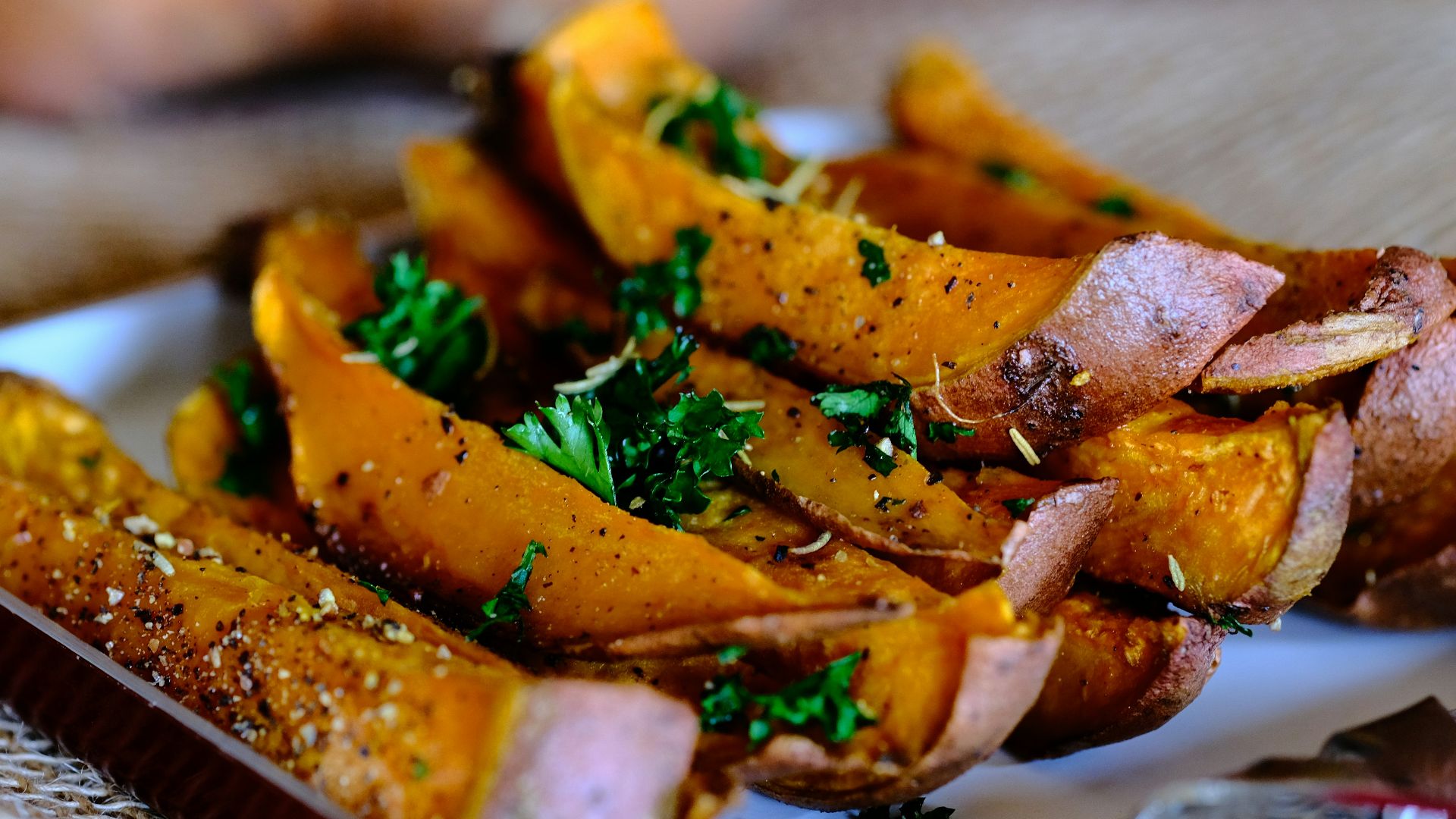 sliced vegetable on brown wooden chopping board
