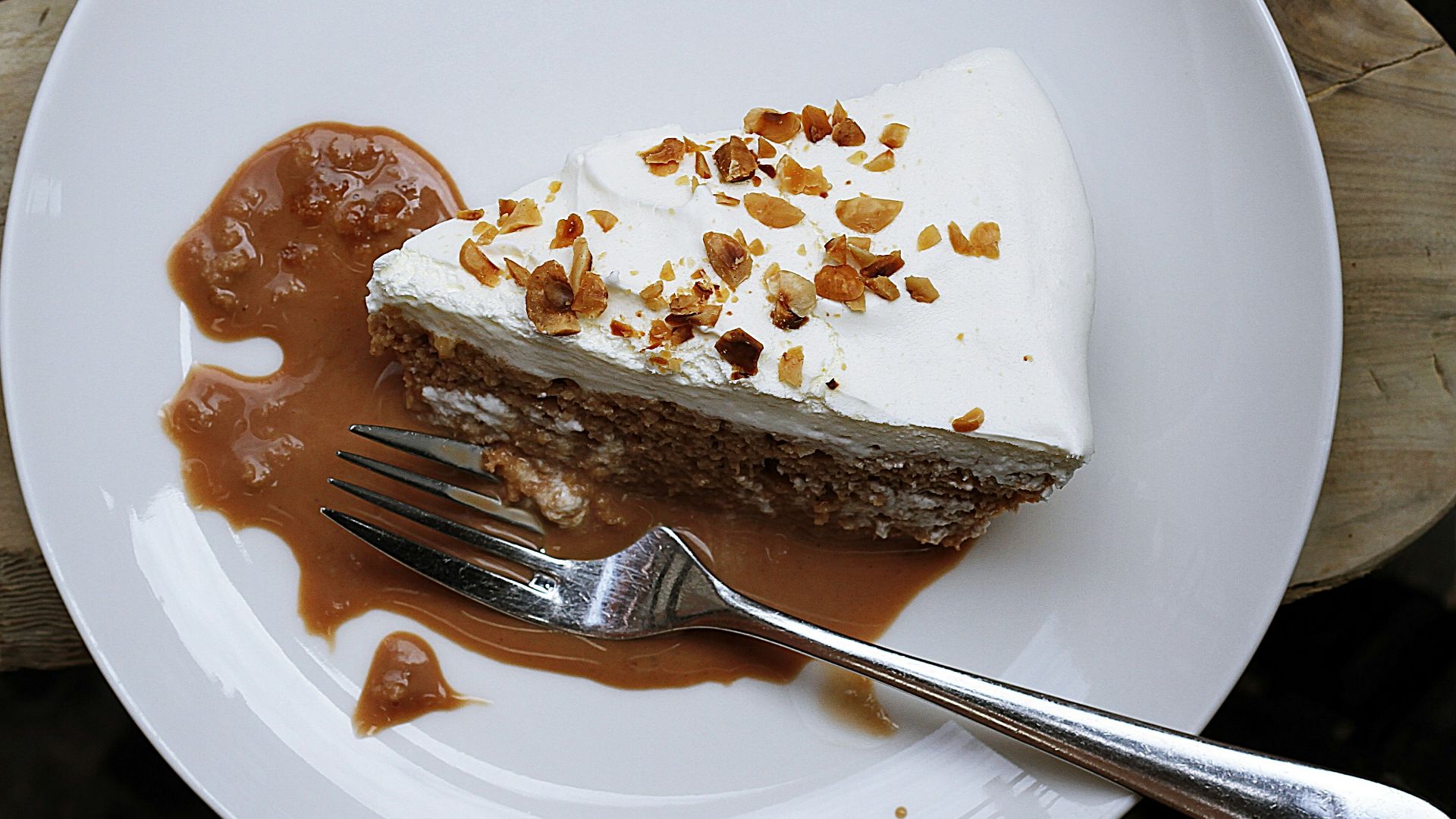 silver fork on round white ceramic plate