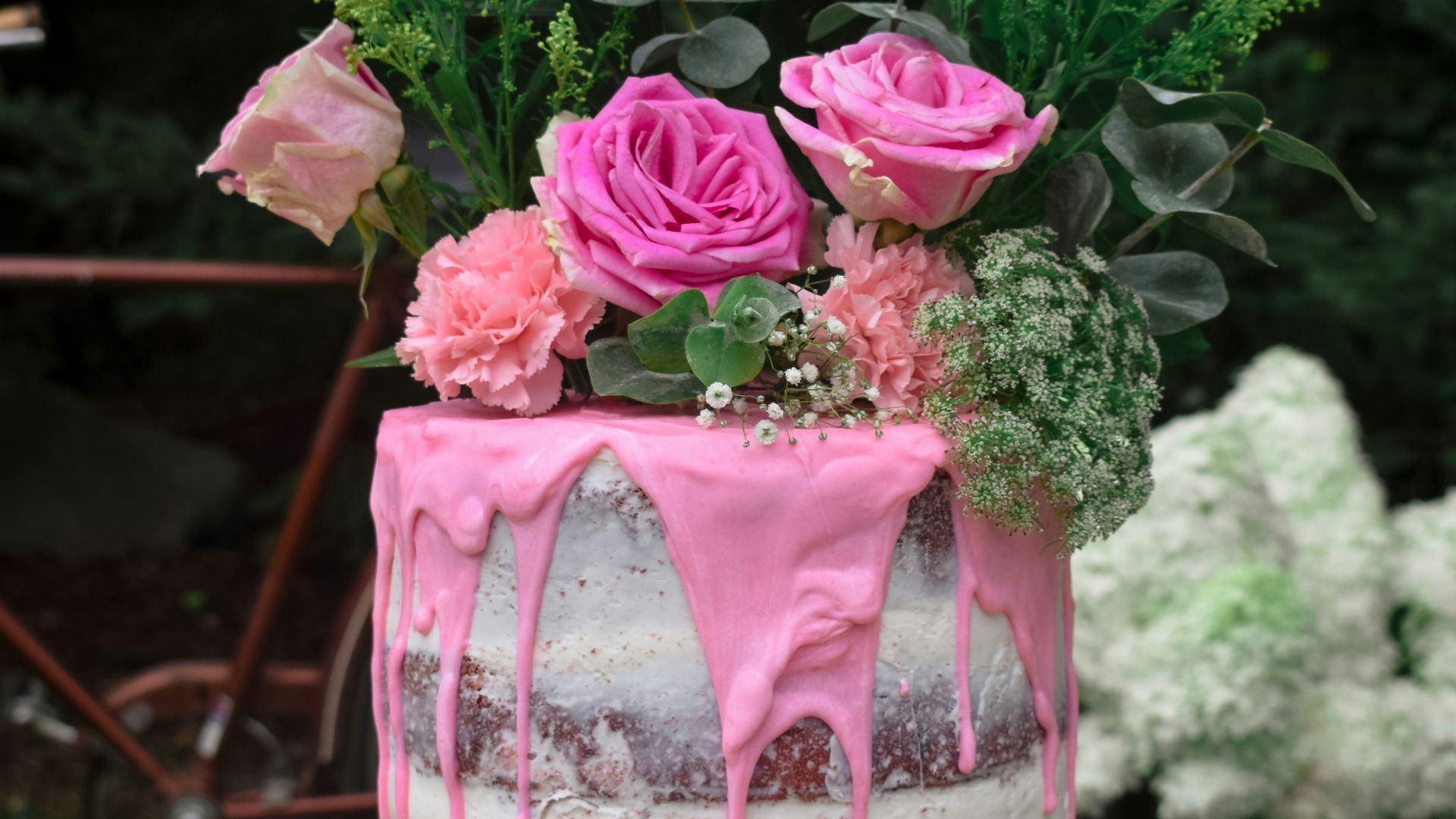 pink roses in clear glass vase