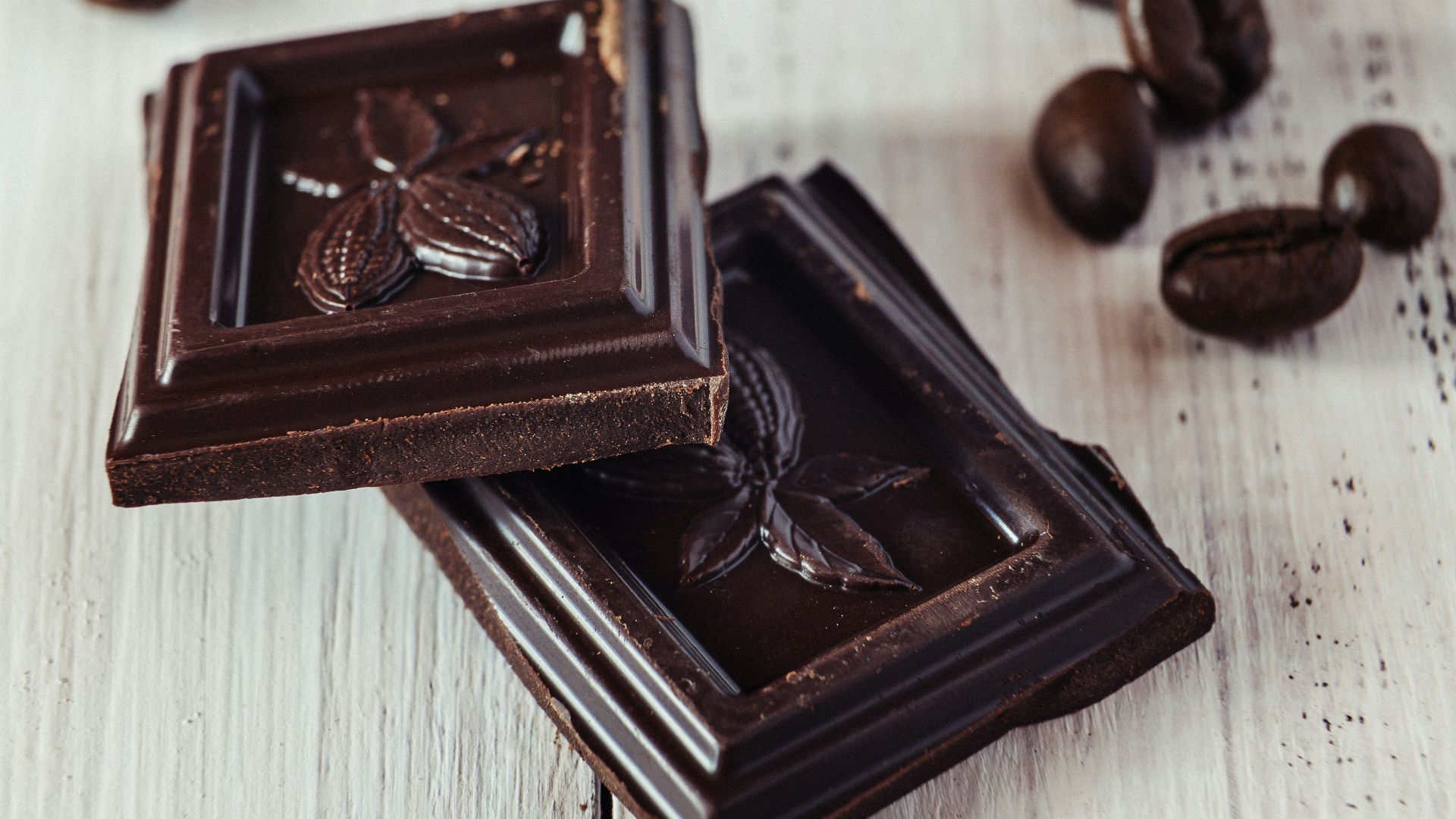 a couple of pieces of chocolate sitting on top of a table