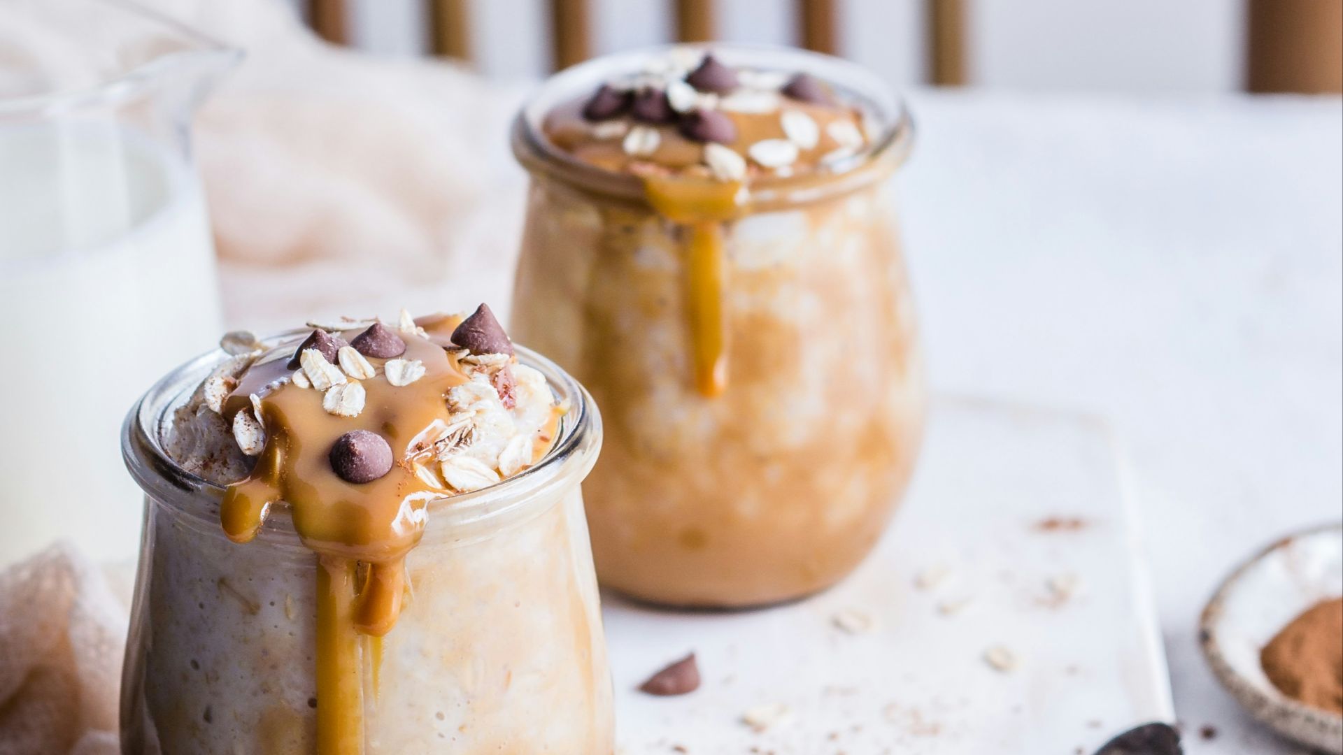 two cups of ice cream with marshmallows