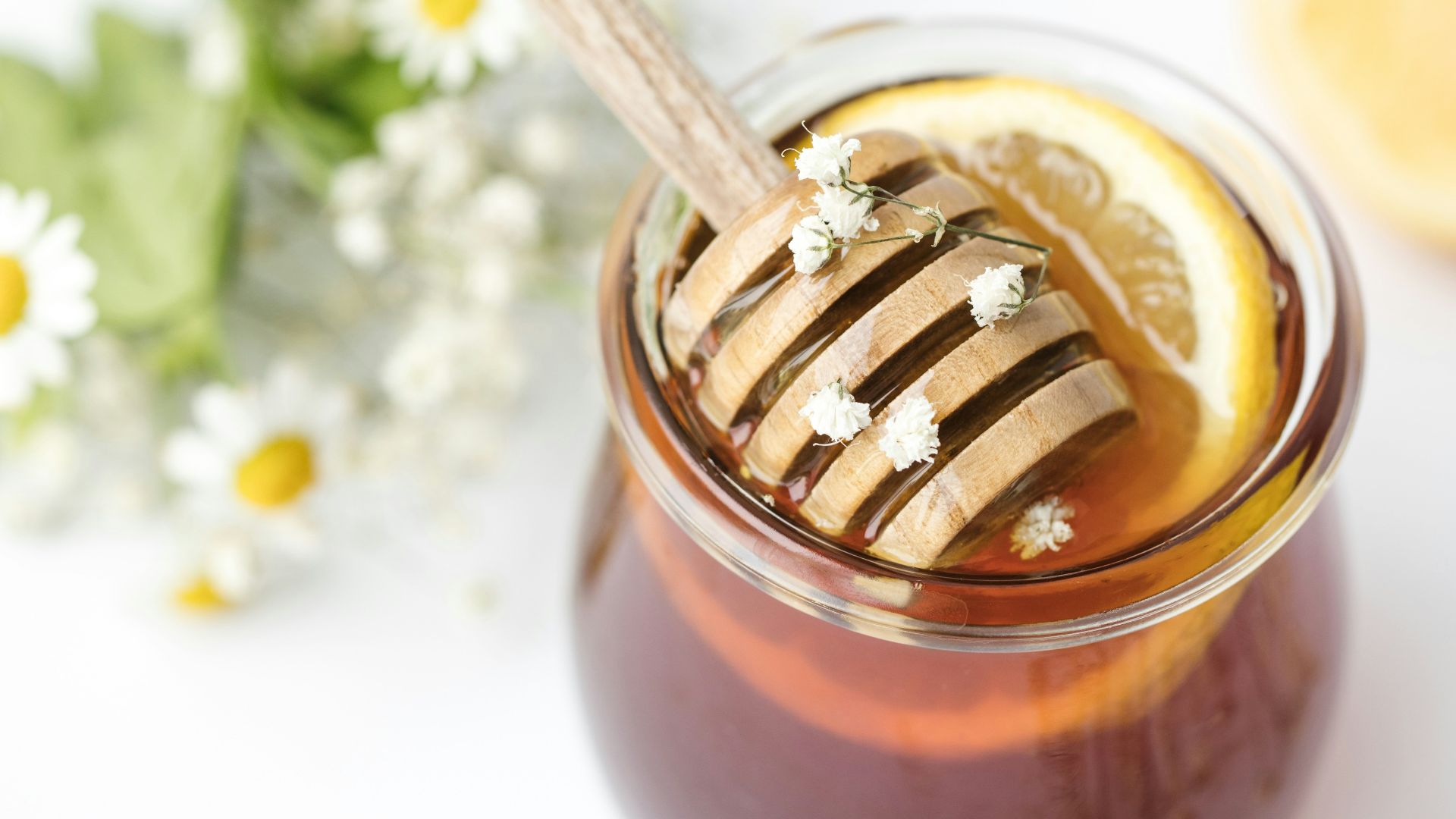 honey in glass on tabel