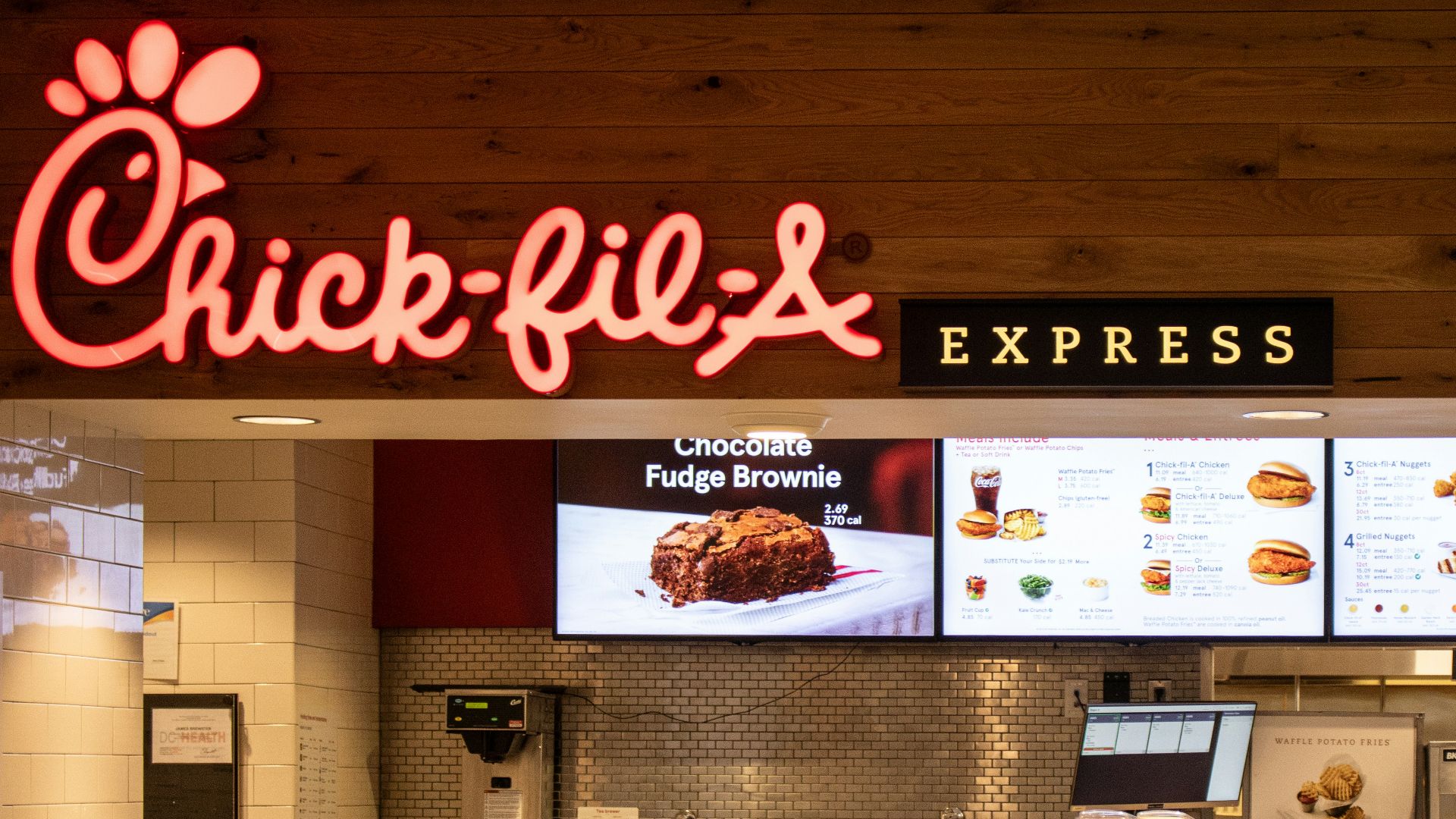 a fast food restaurant with a large menu