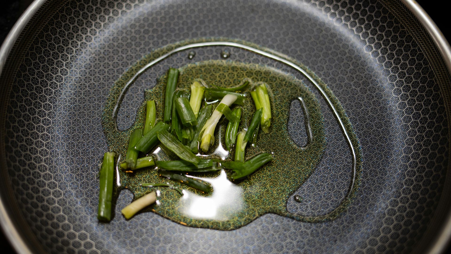 green vegetable on stainless steel round plate