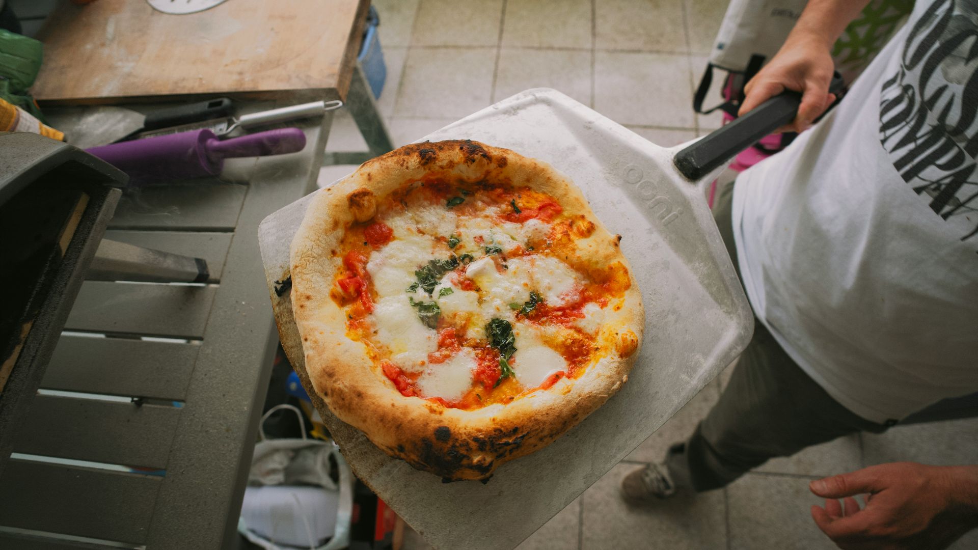 a pizza sitting on top of a piece of paper