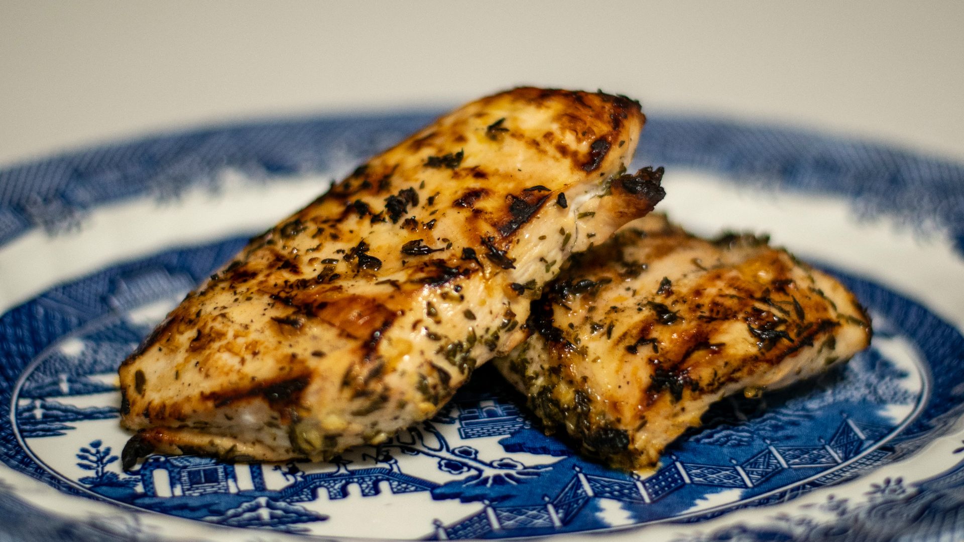 brown bread on white and blue ceramic plate