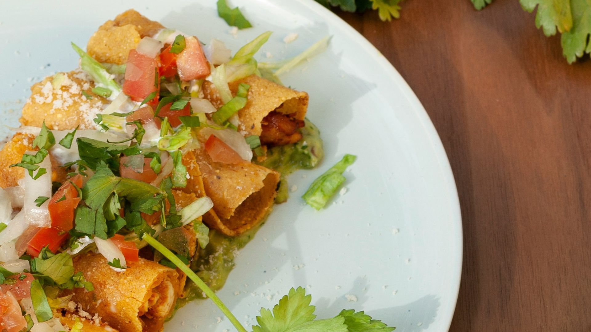a plate of food and a drink on a table
