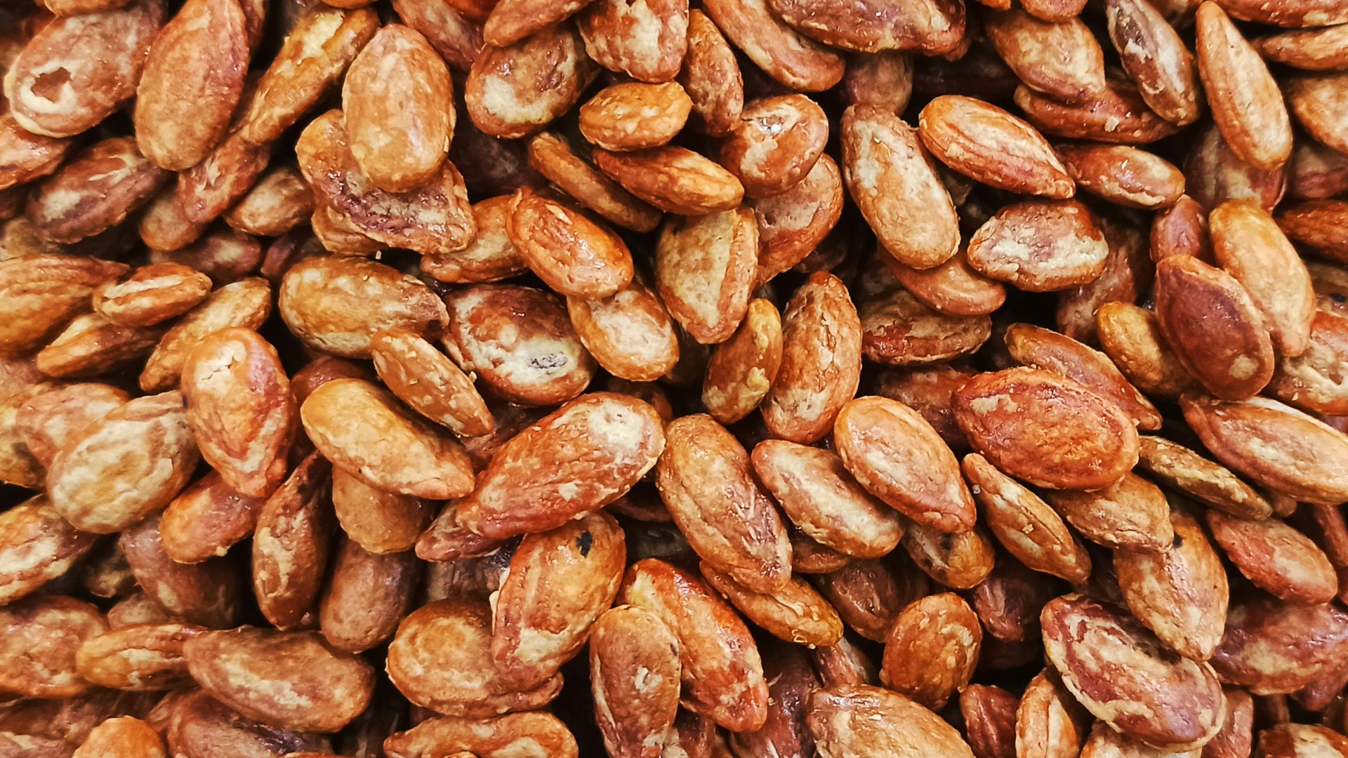 a pile of nuts sitting on top of a table