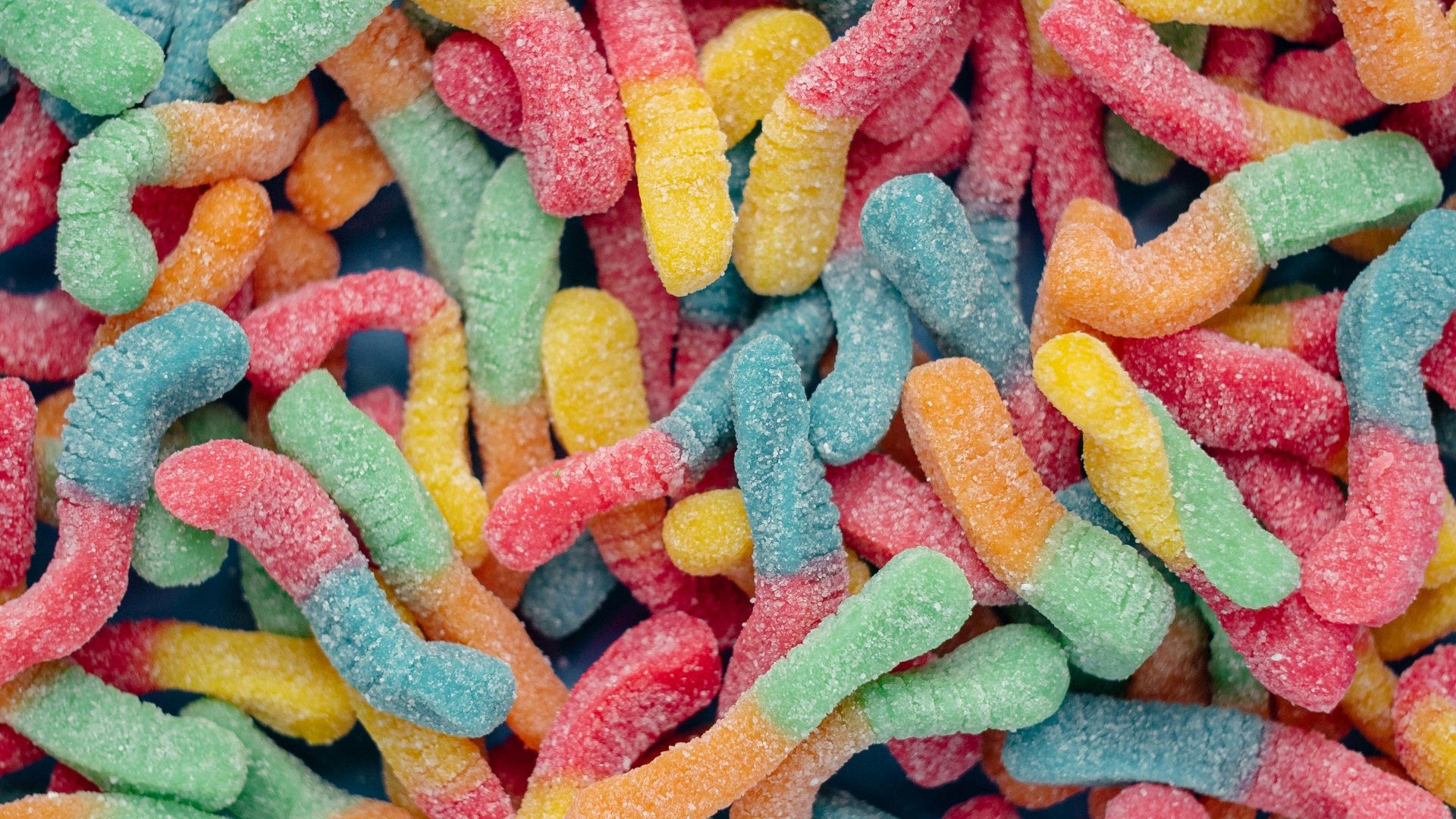 pink yellow and blue candies