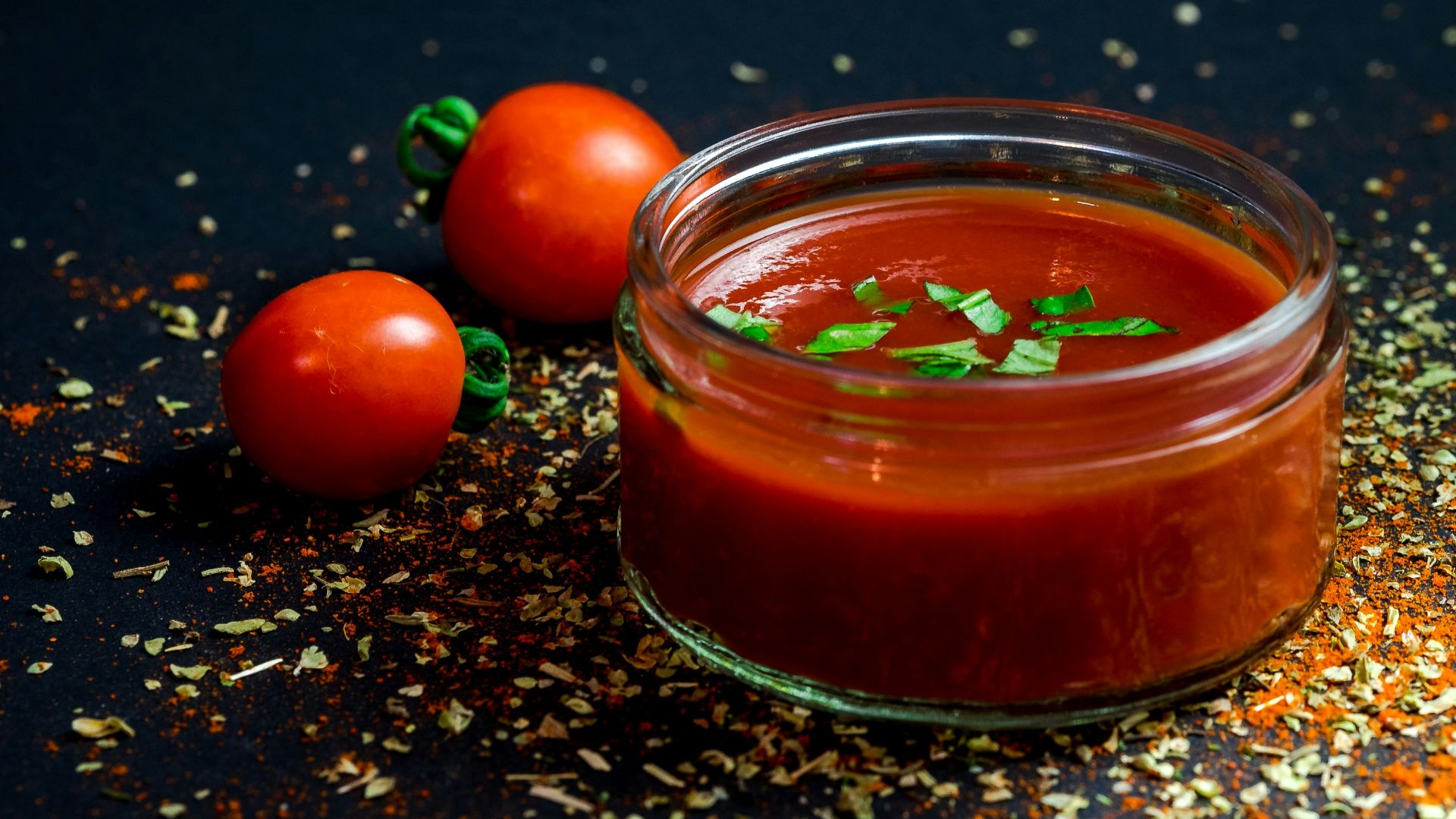 tomato and tomato puree with parsley in bowl