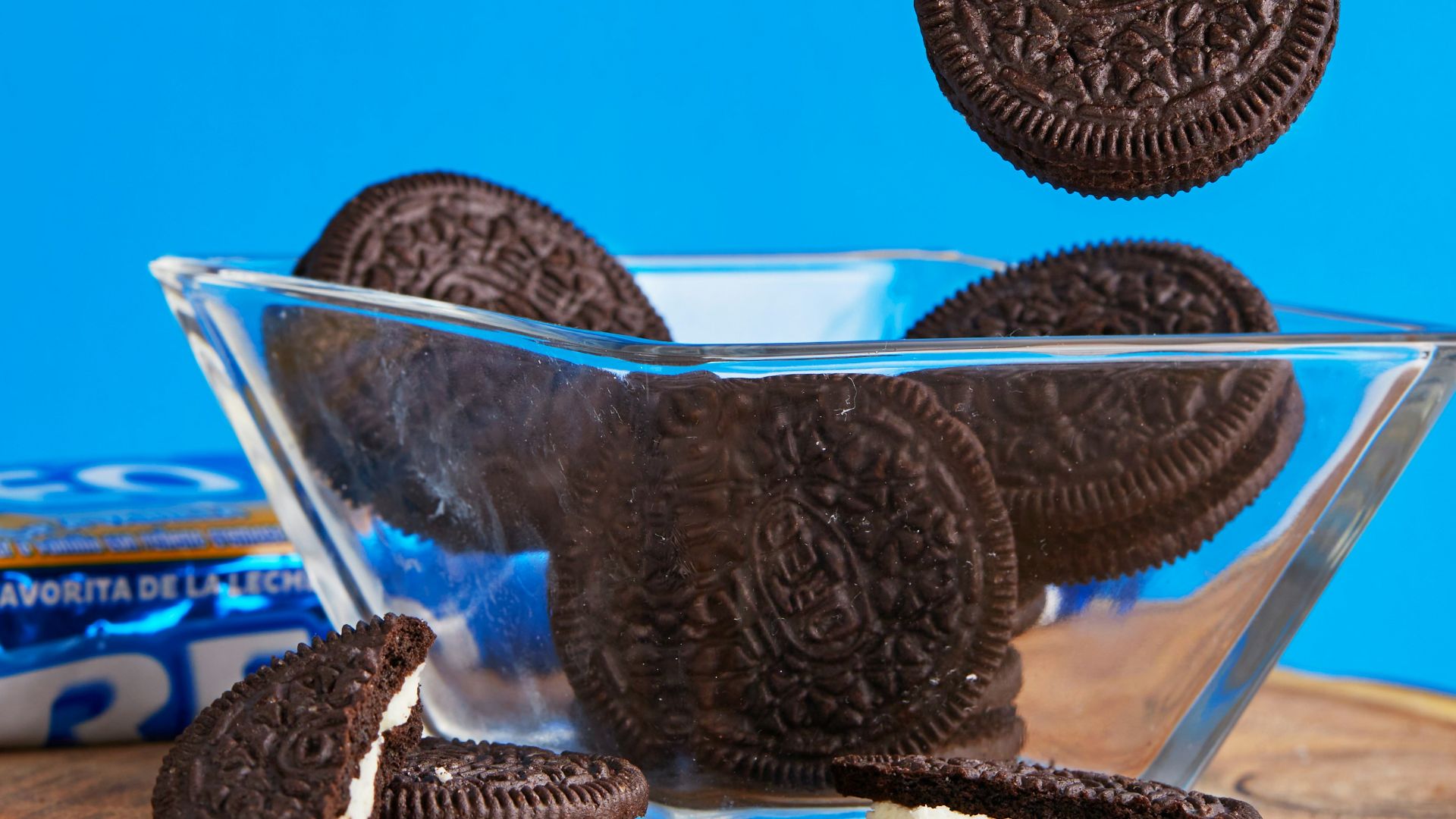 stainless steel bowl on brown wooden table