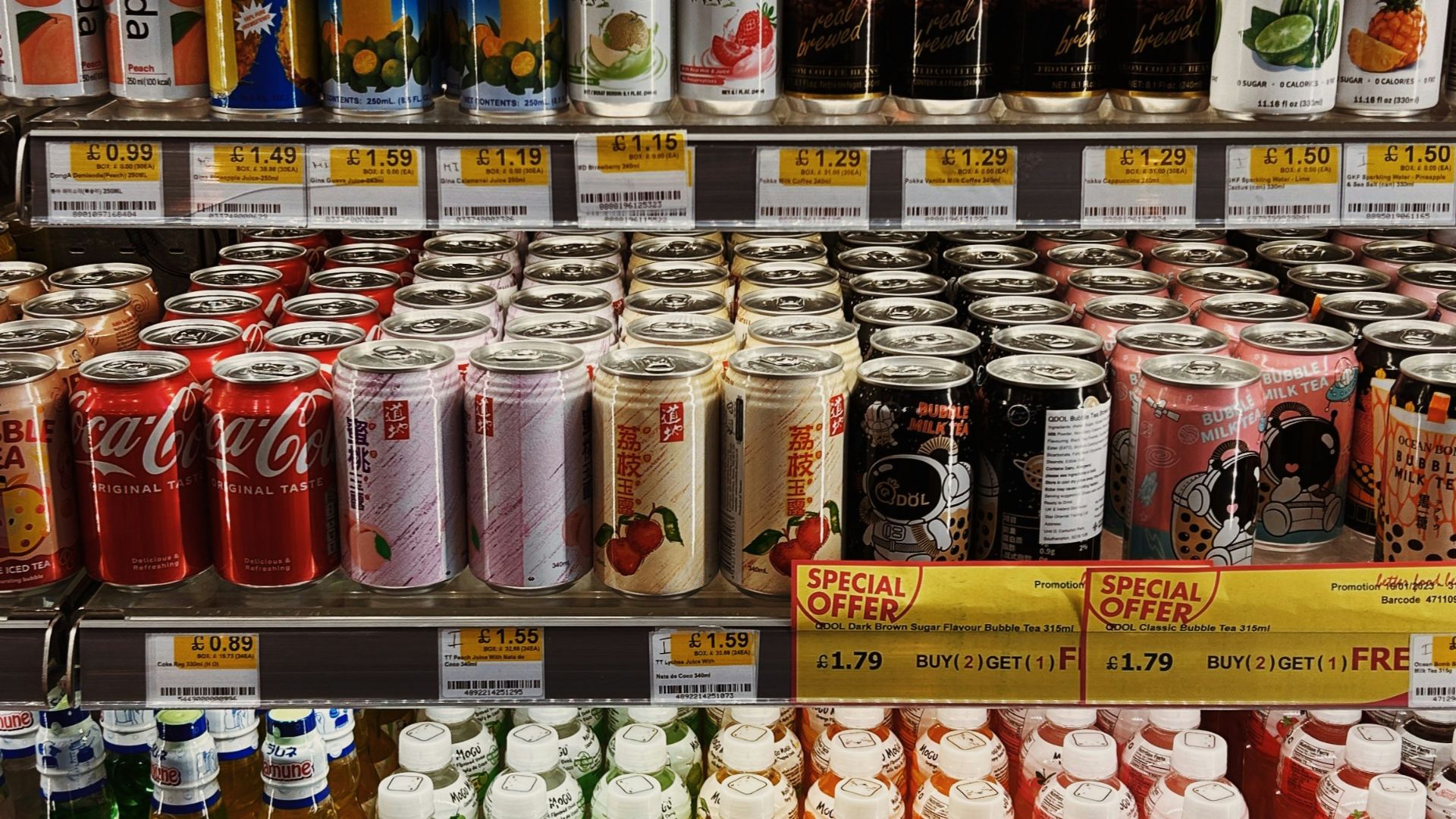 a display in a store filled with lots of drinks