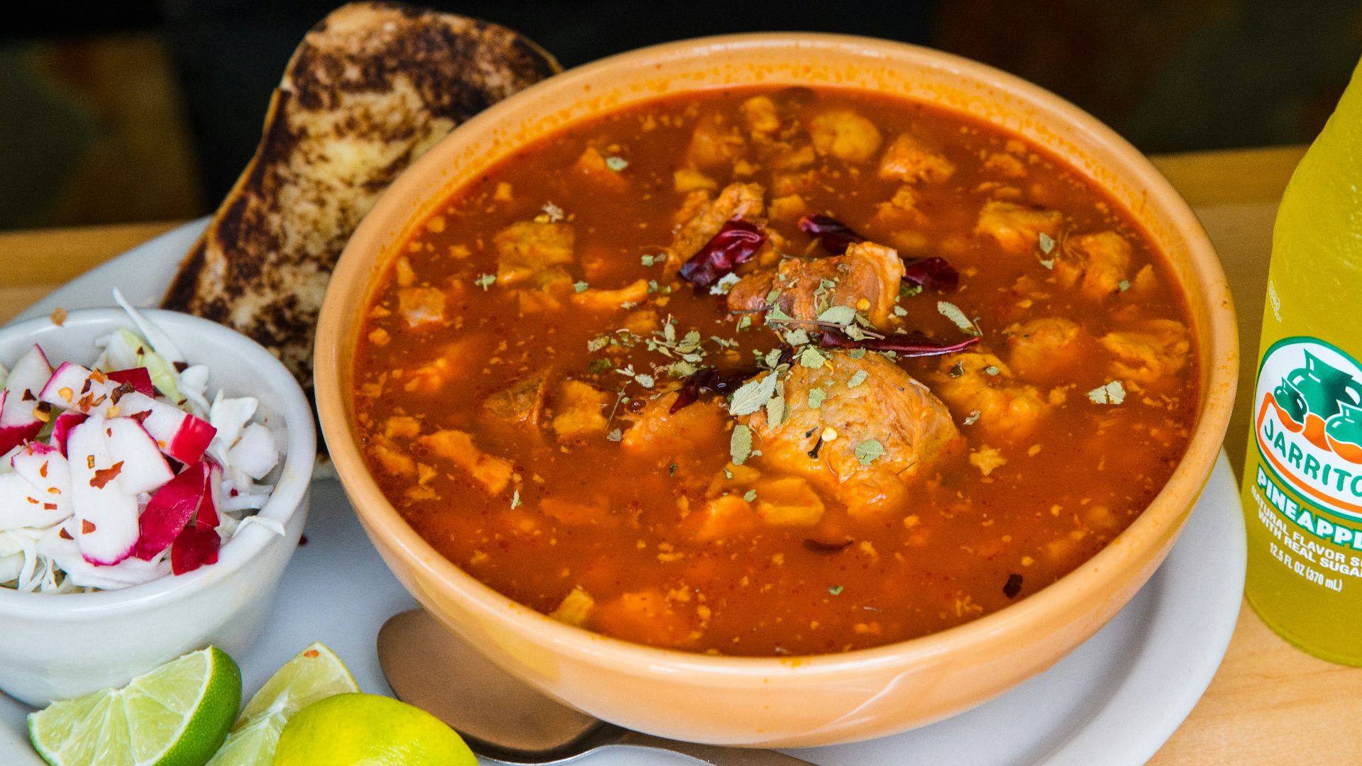 soup with meat in white ceramic bowl