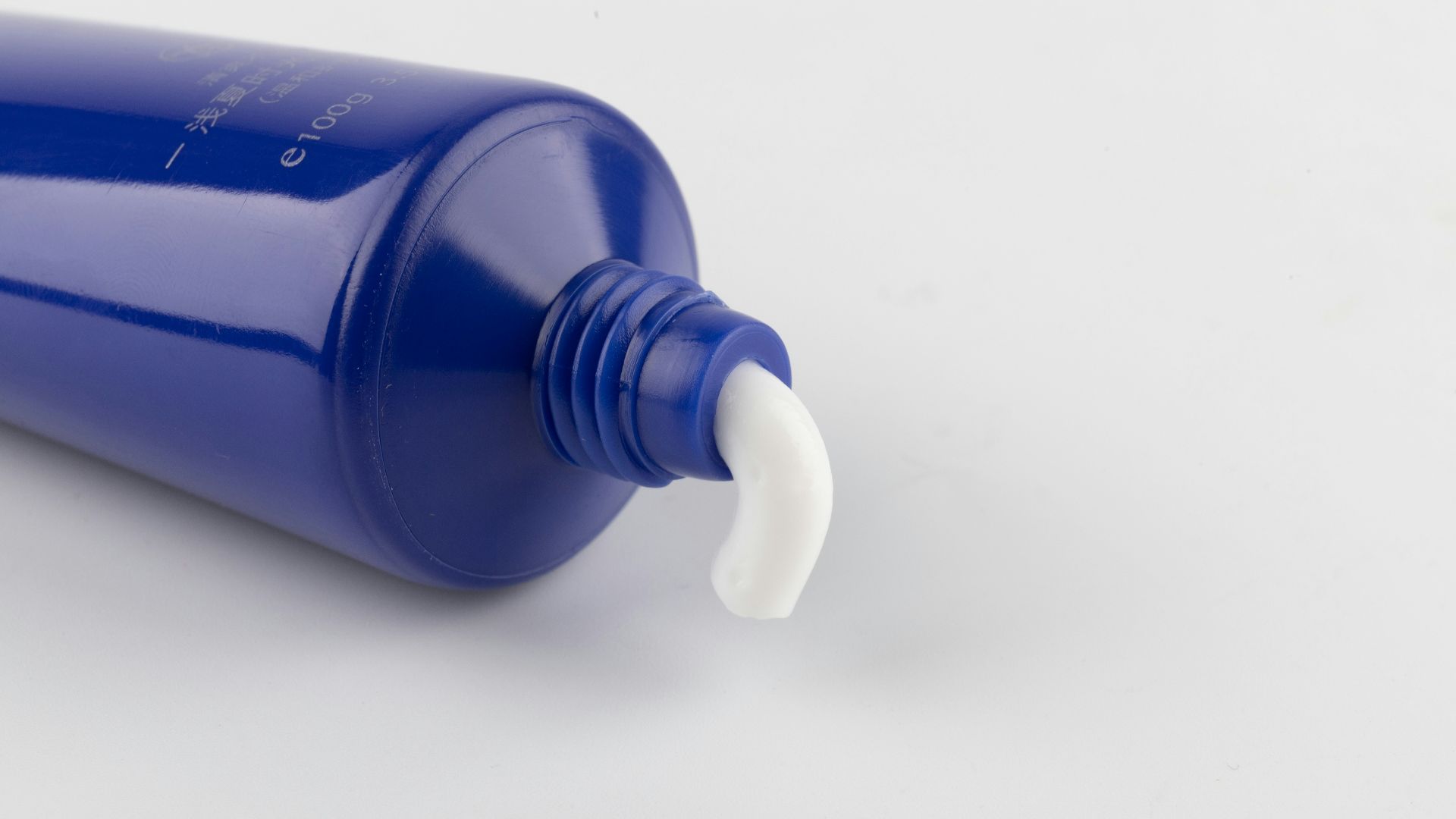 blue and white plastic bottle