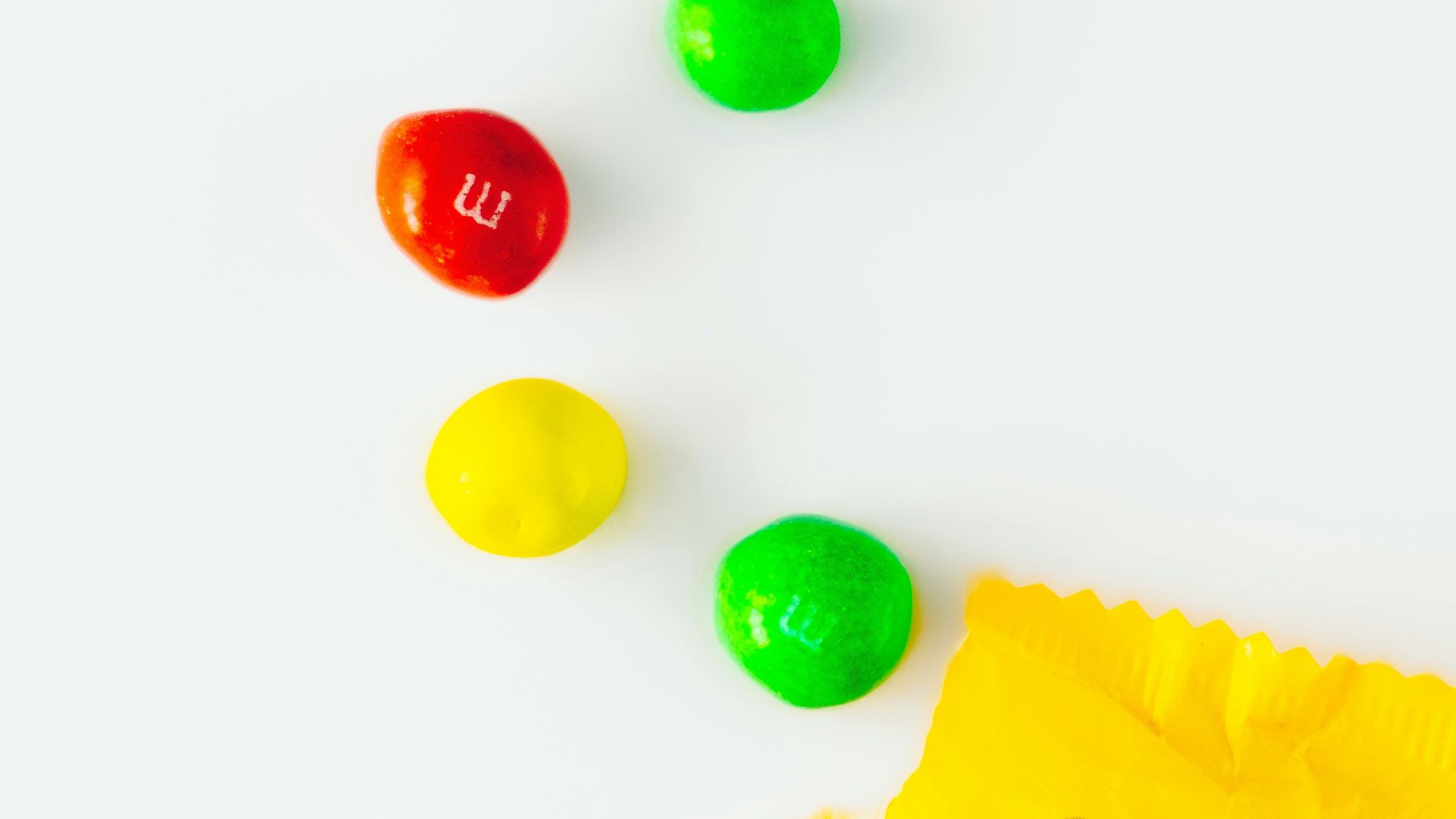 a bag of candy sitting on top of a white table