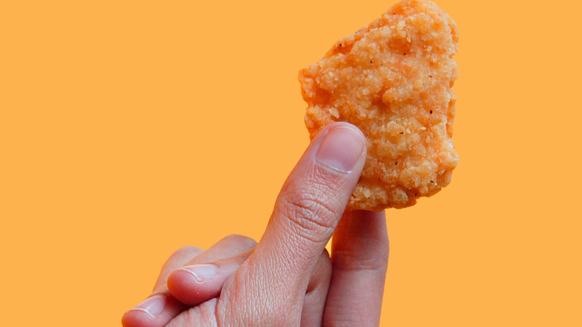 person holding biscuit