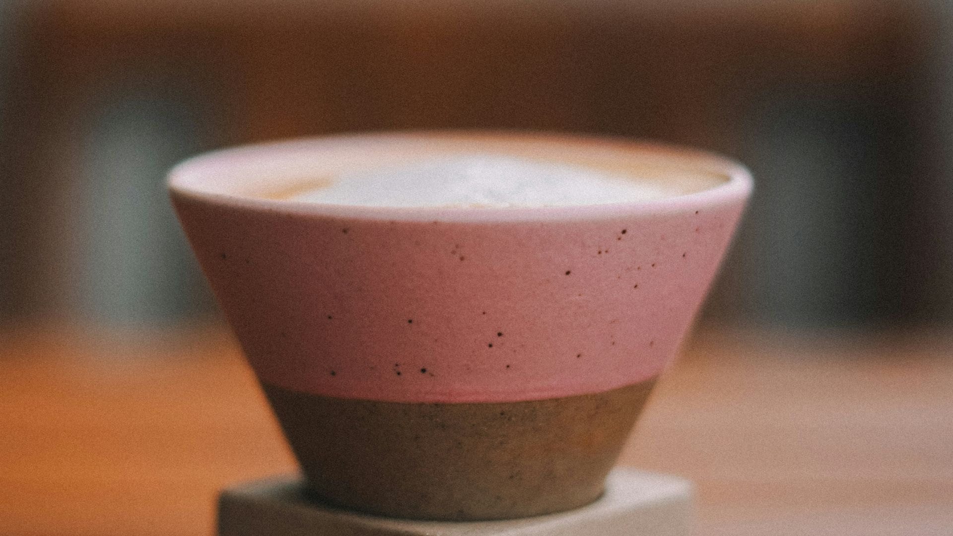 A small bowl sitting on top of a wooden table