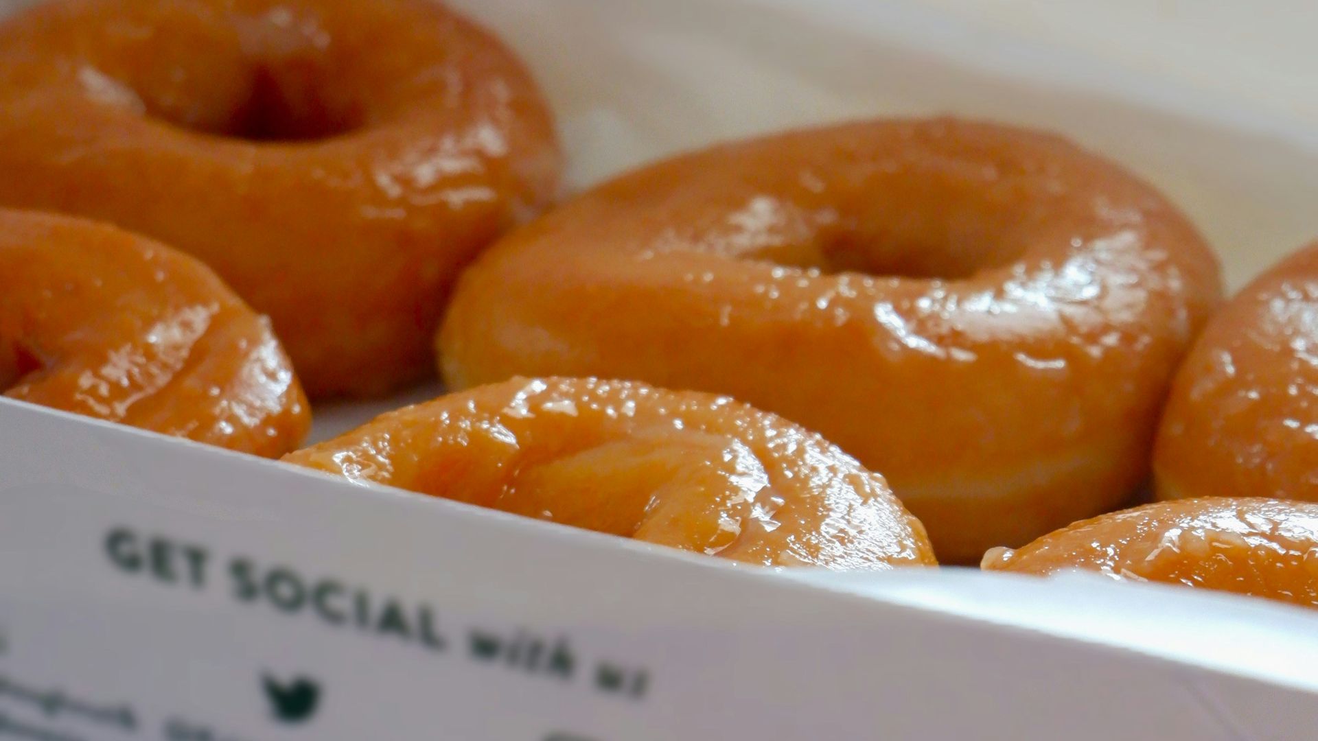 a box of krispy kreme glazed donuts