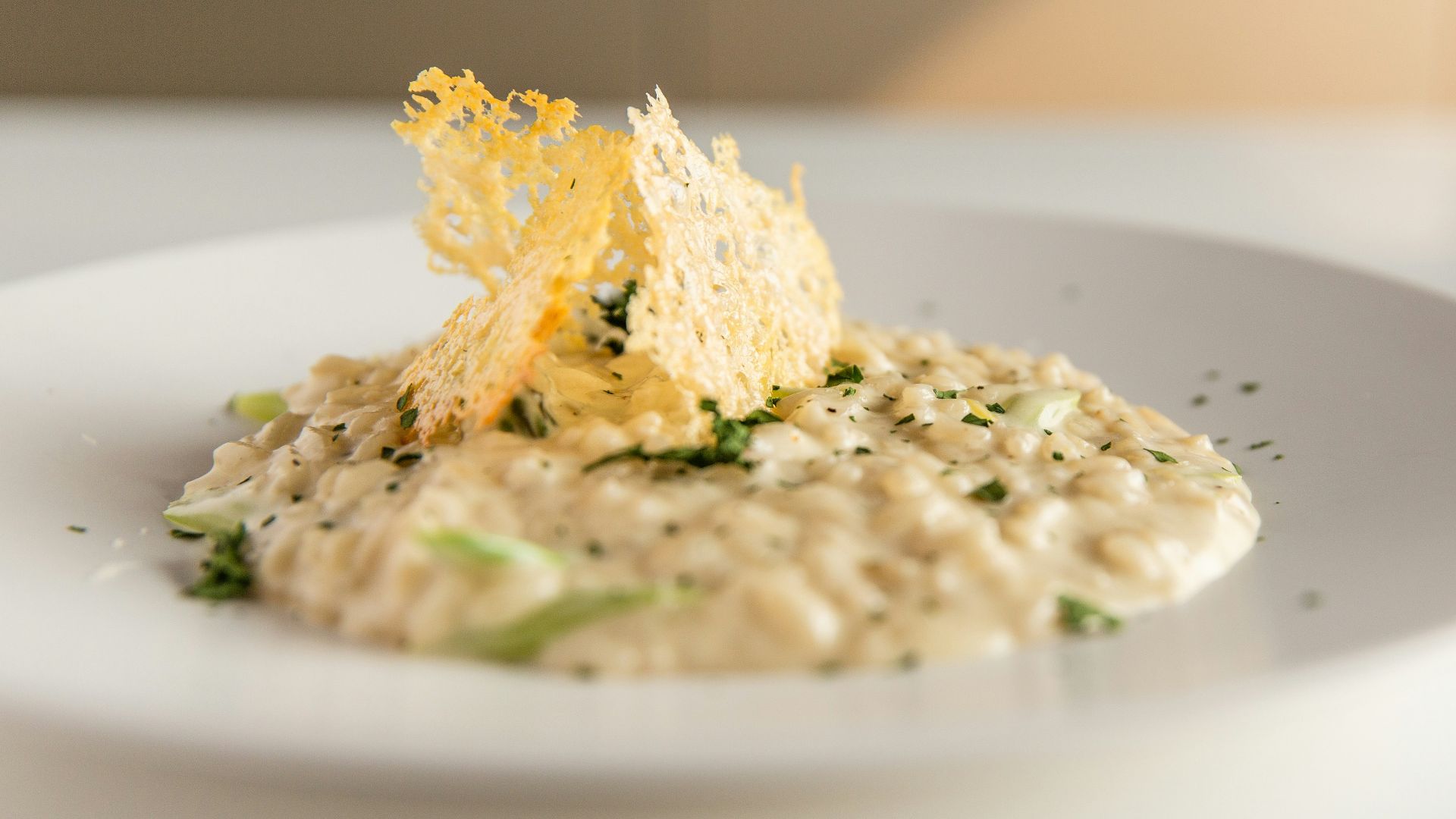 a white plate topped with food on top of a table