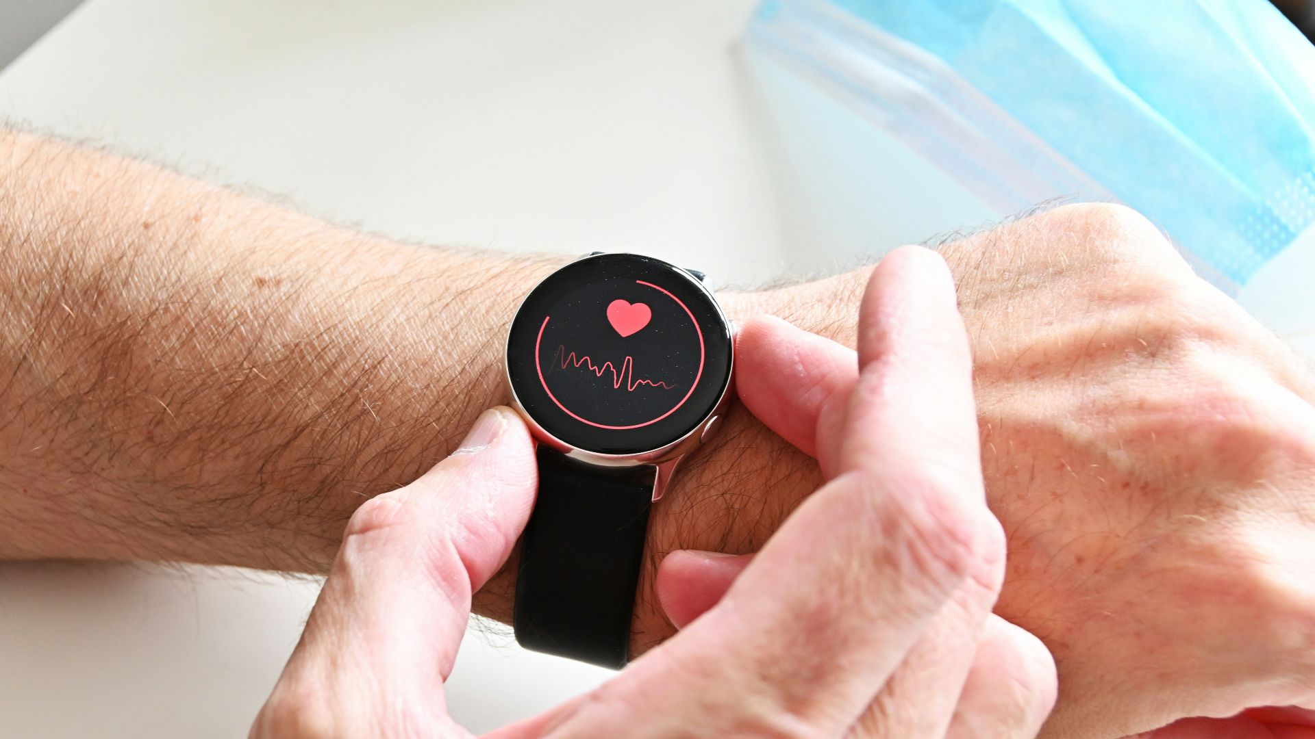 a person holding a stopwatch