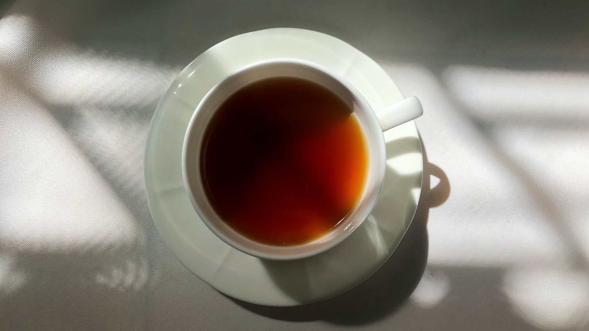 a cup of tea sitting on top of a table