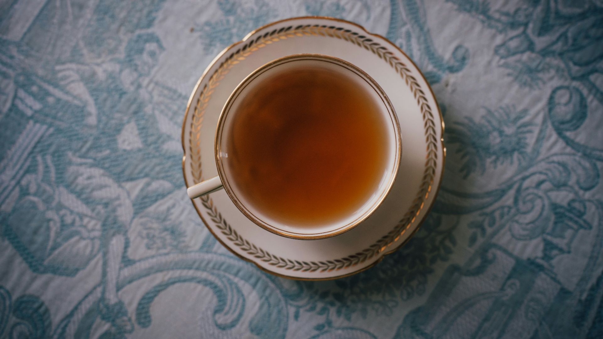 a cup of tea sitting on top of a table