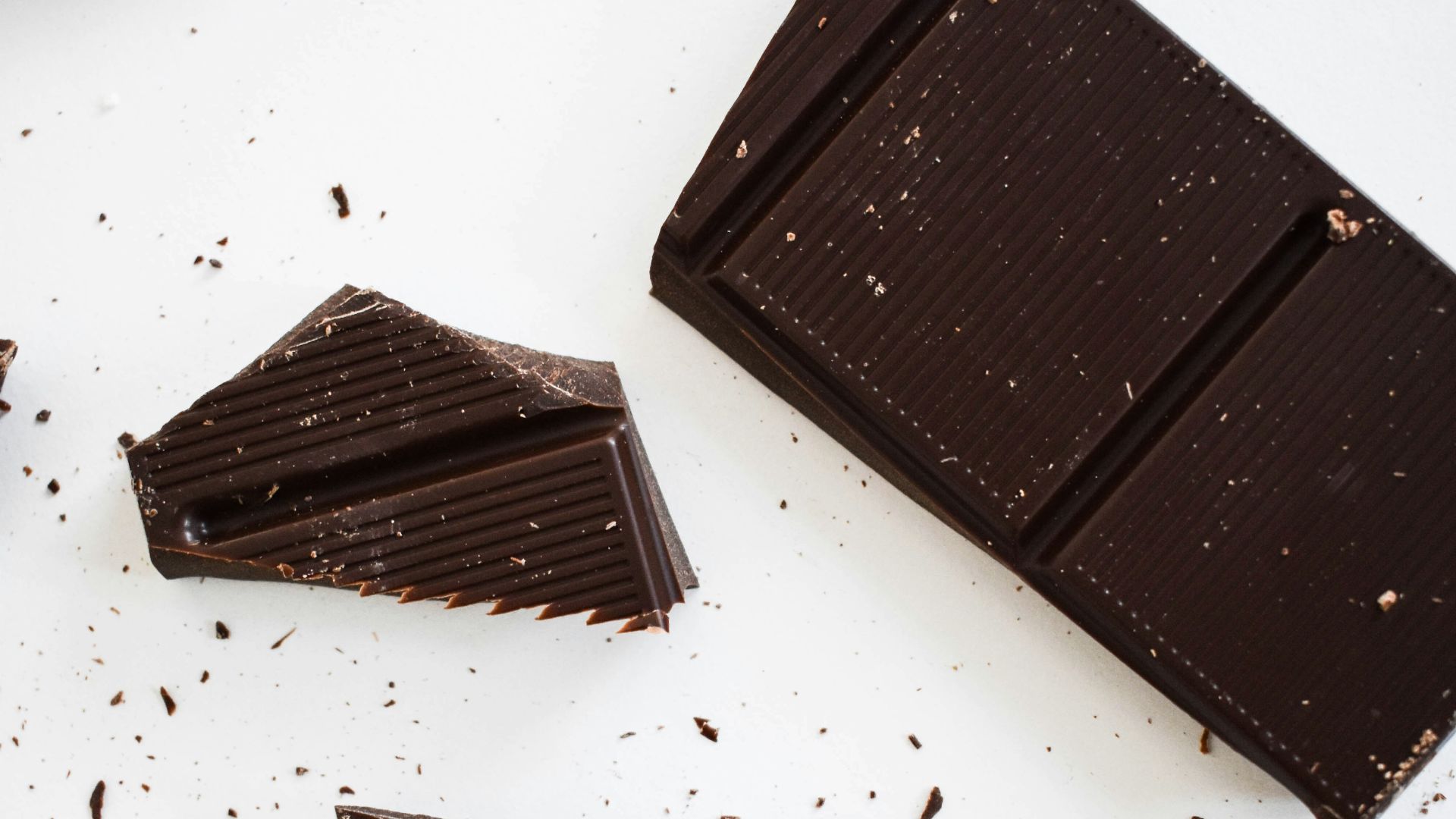 four pieces of chocolate sitting on top of each other