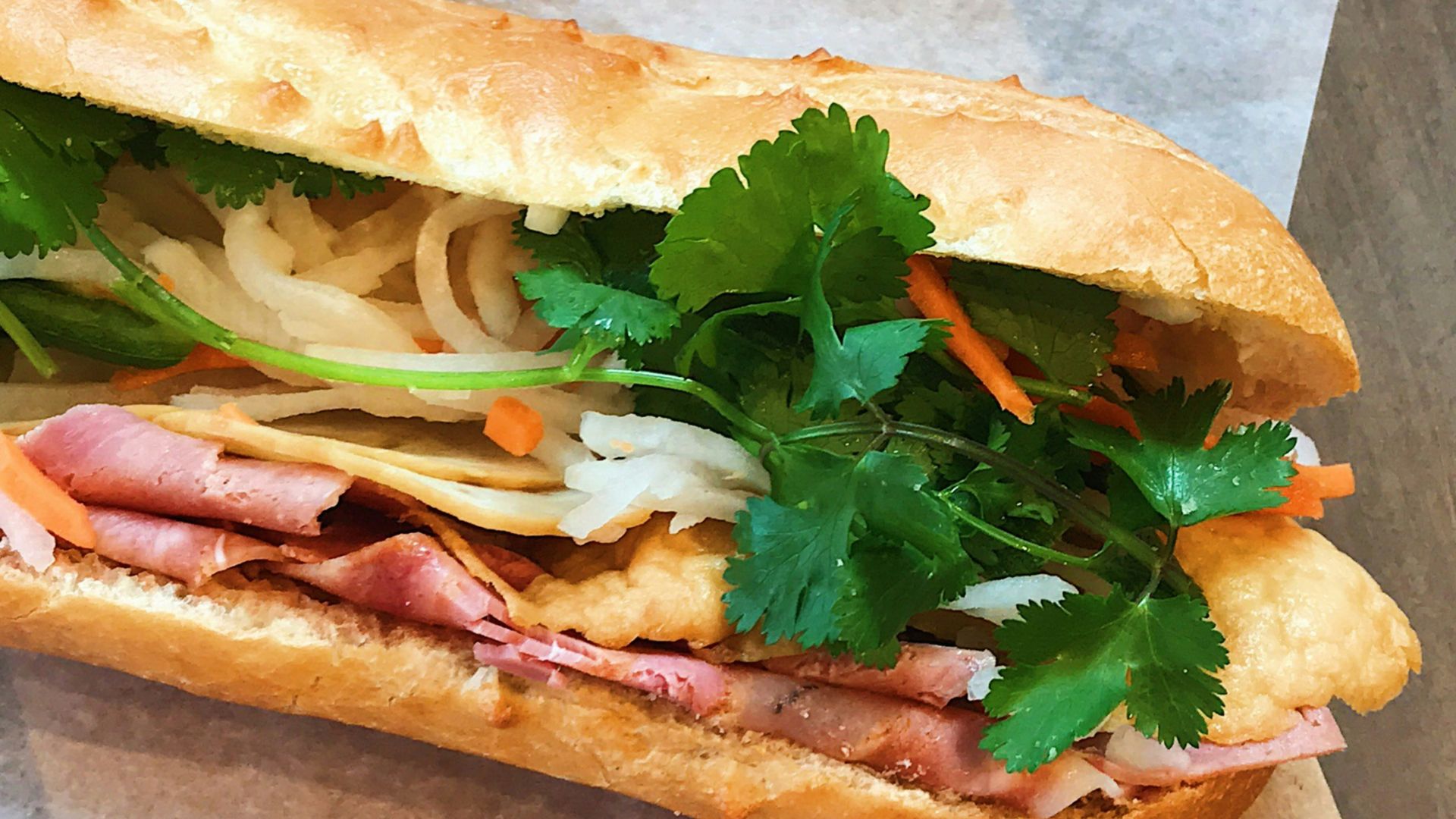 green vegetable on brown bread