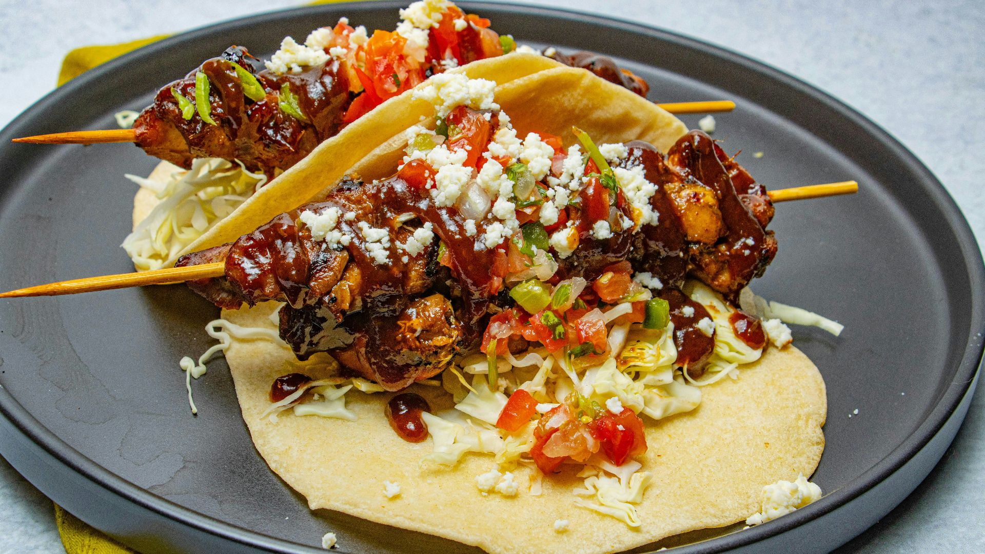 A plate of food with meat and vegetables on it