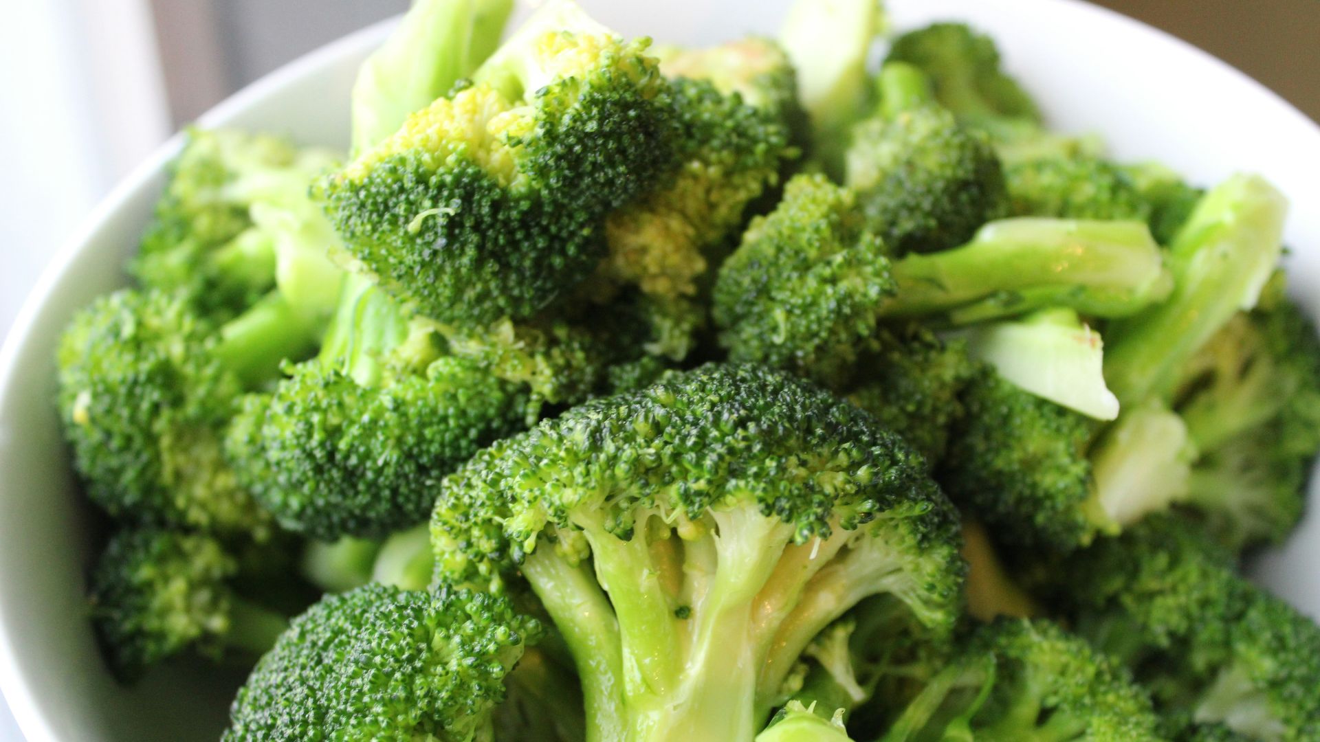 green broccoli on white ceramic plate
