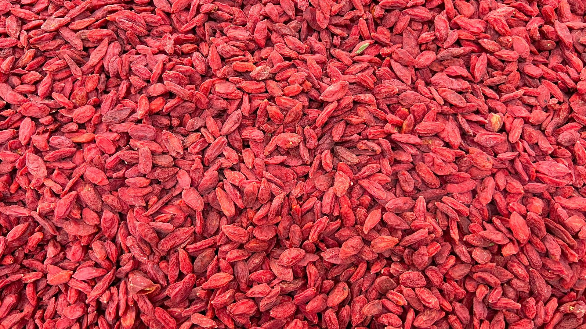 a large pile of red gourmet food
