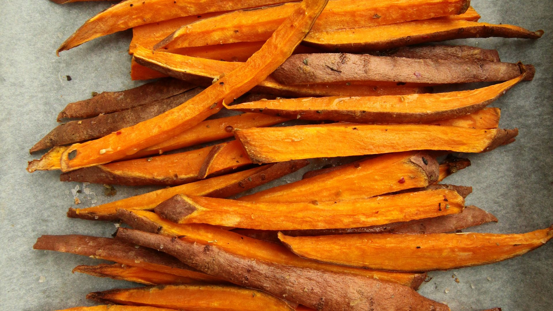 sliced carrots on gray surface