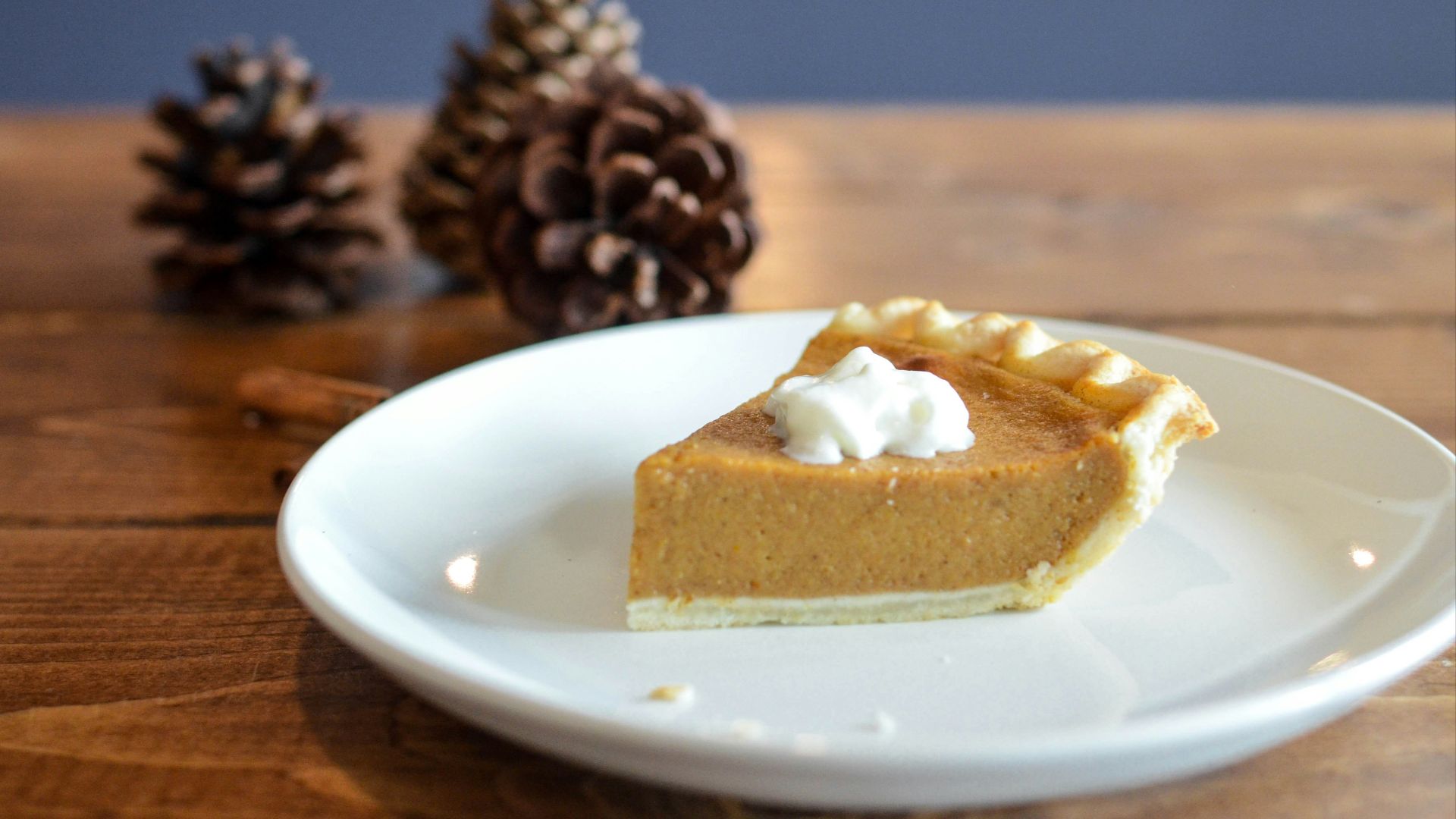 closeup photo of sliced pie on white ceramic saucer