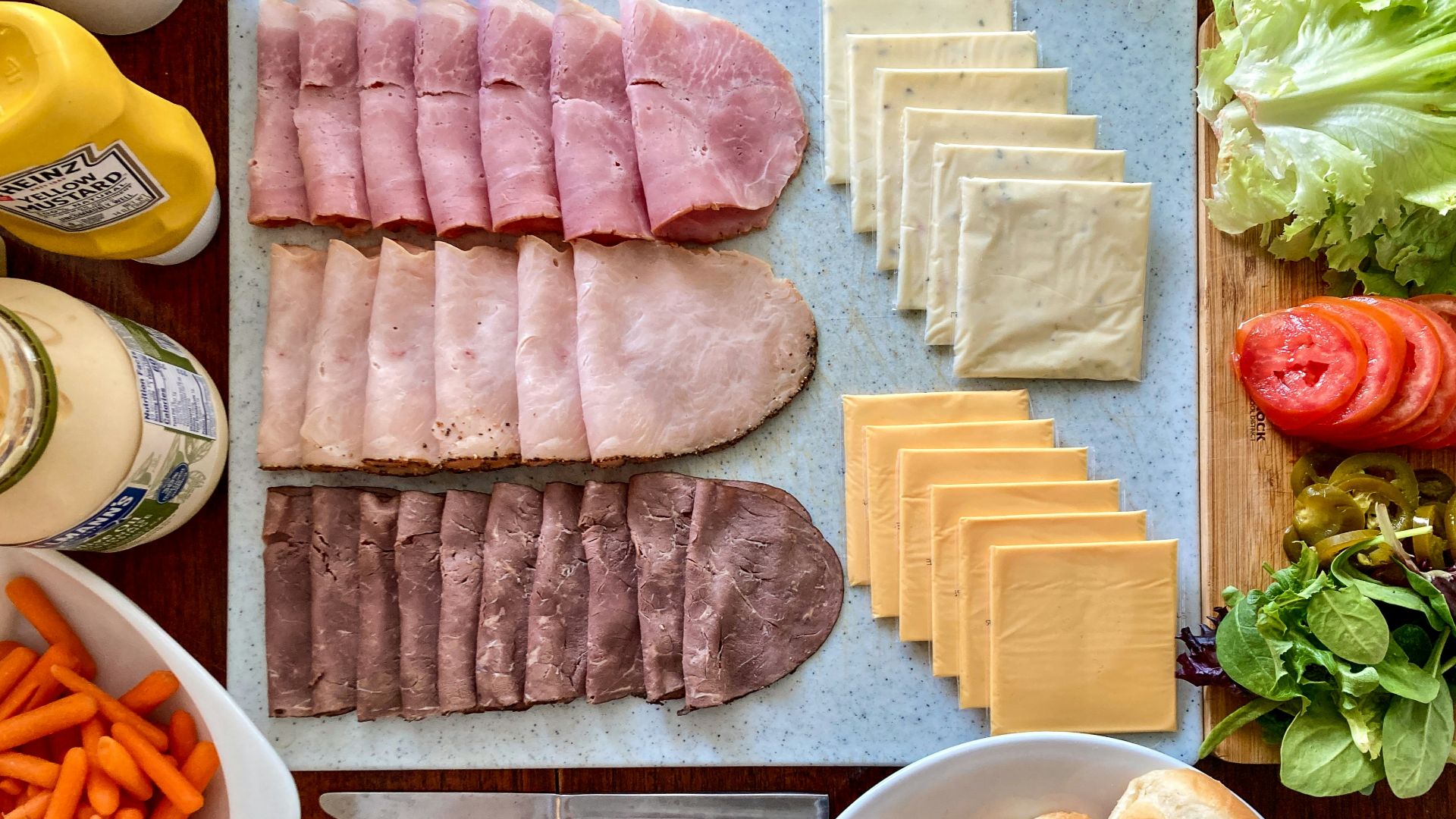 a variety of food is laid out on a table