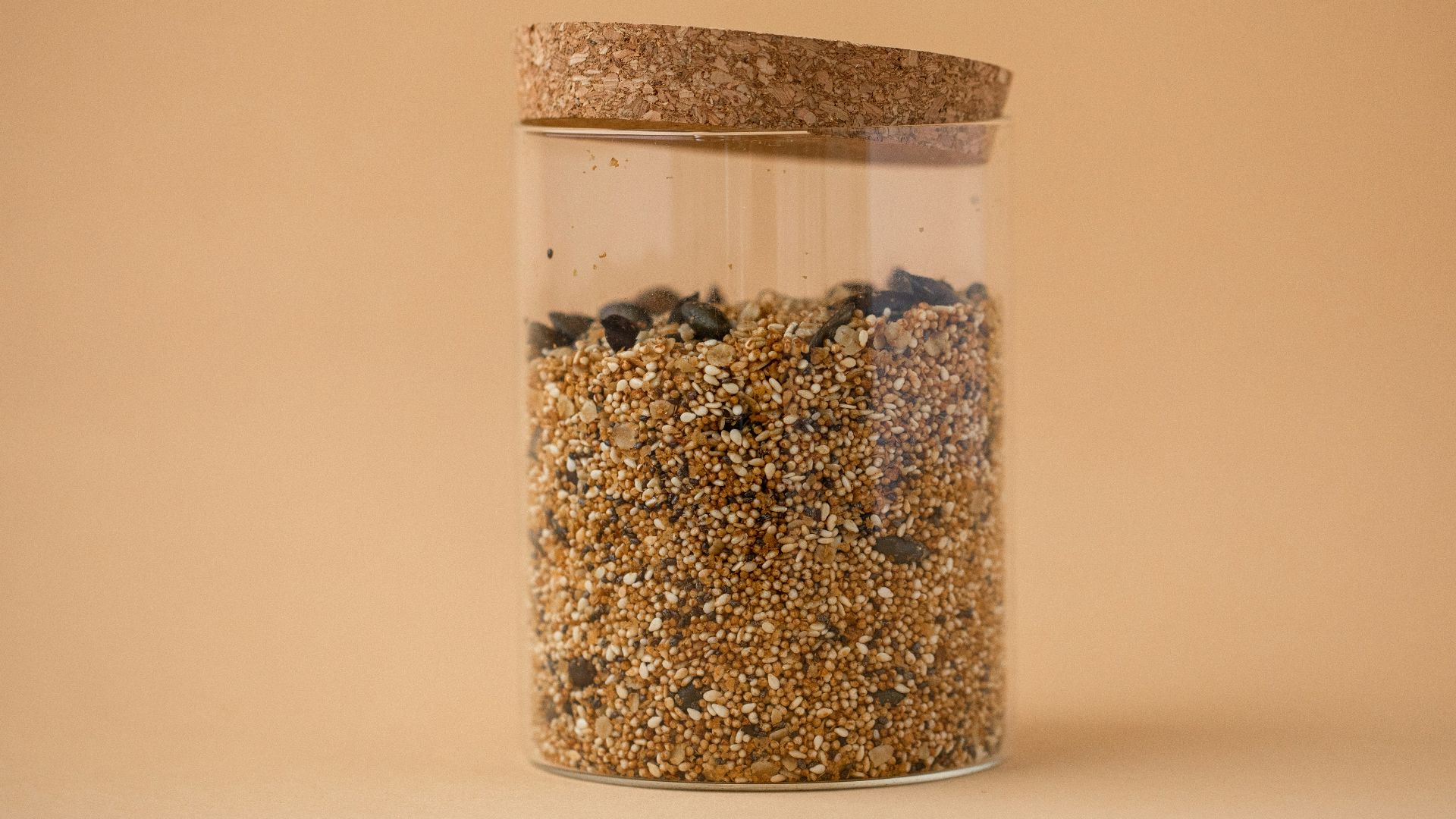 a jar filled with lots of different types of food