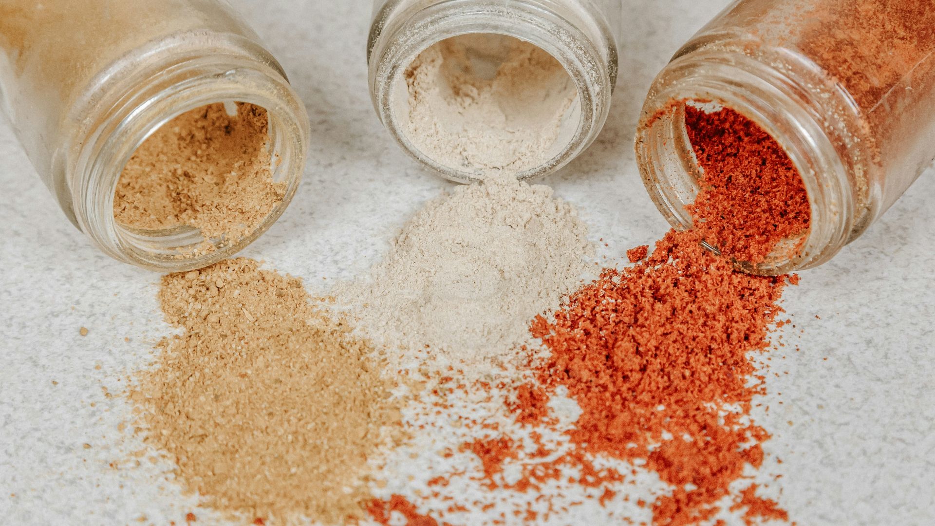 brown powder in clear glass jar