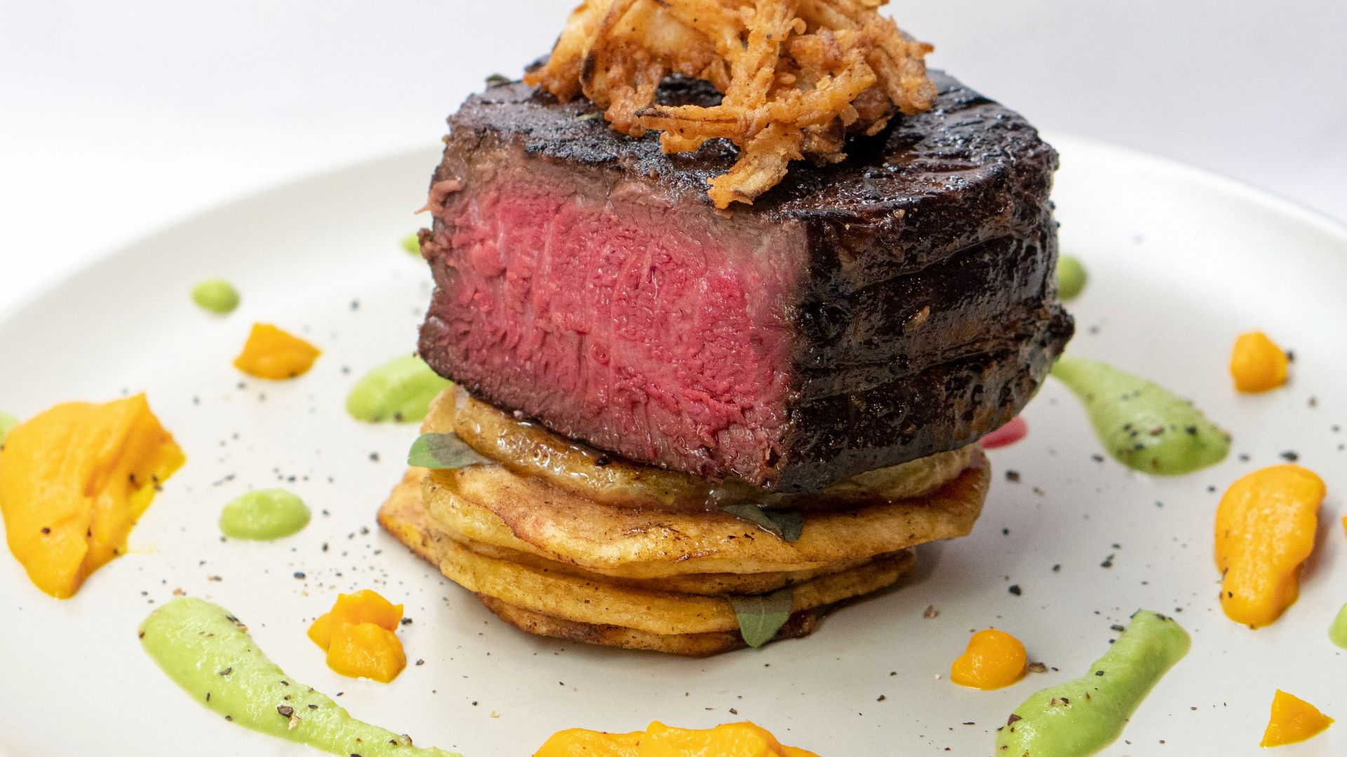 brown bread with cheese on white ceramic plate