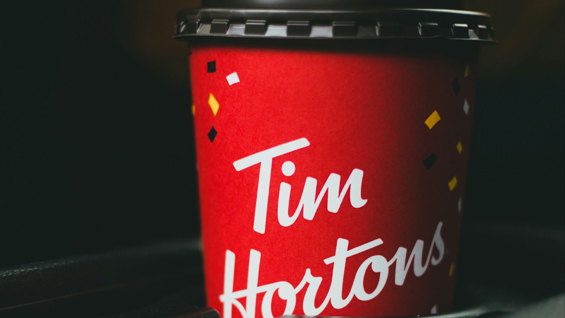 red and white coffee cup