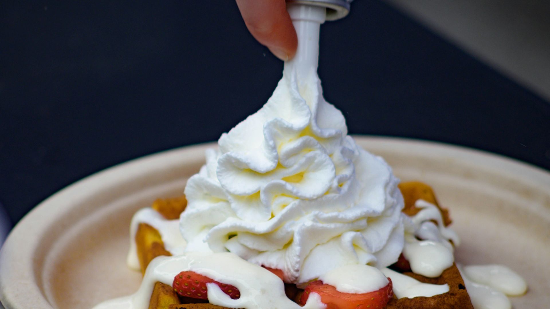 white icing on brown cake