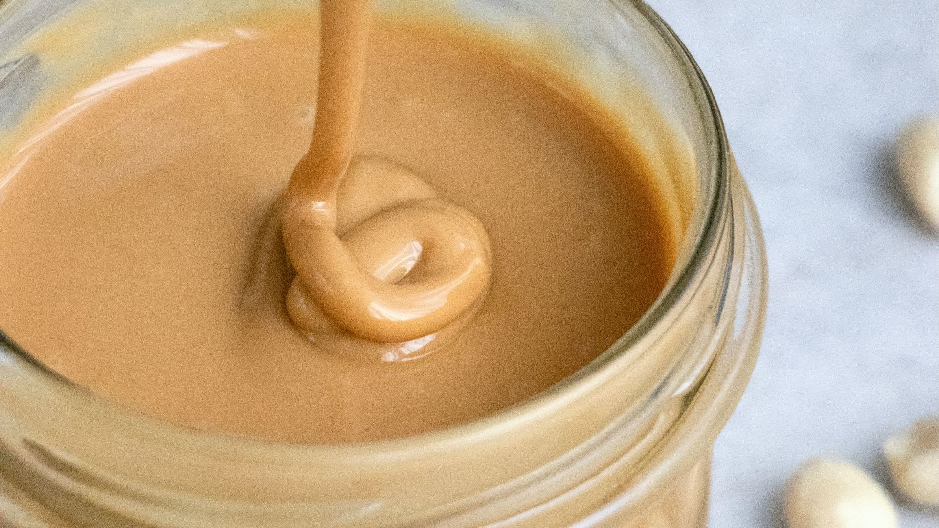 clear glass jar with brown liquid