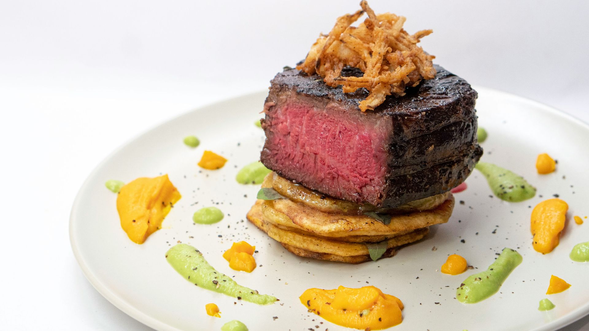 brown bread with cheese on white ceramic plate