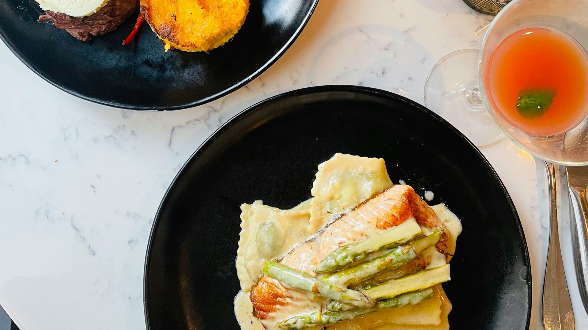 Delicious meal with drink and some appetizers.