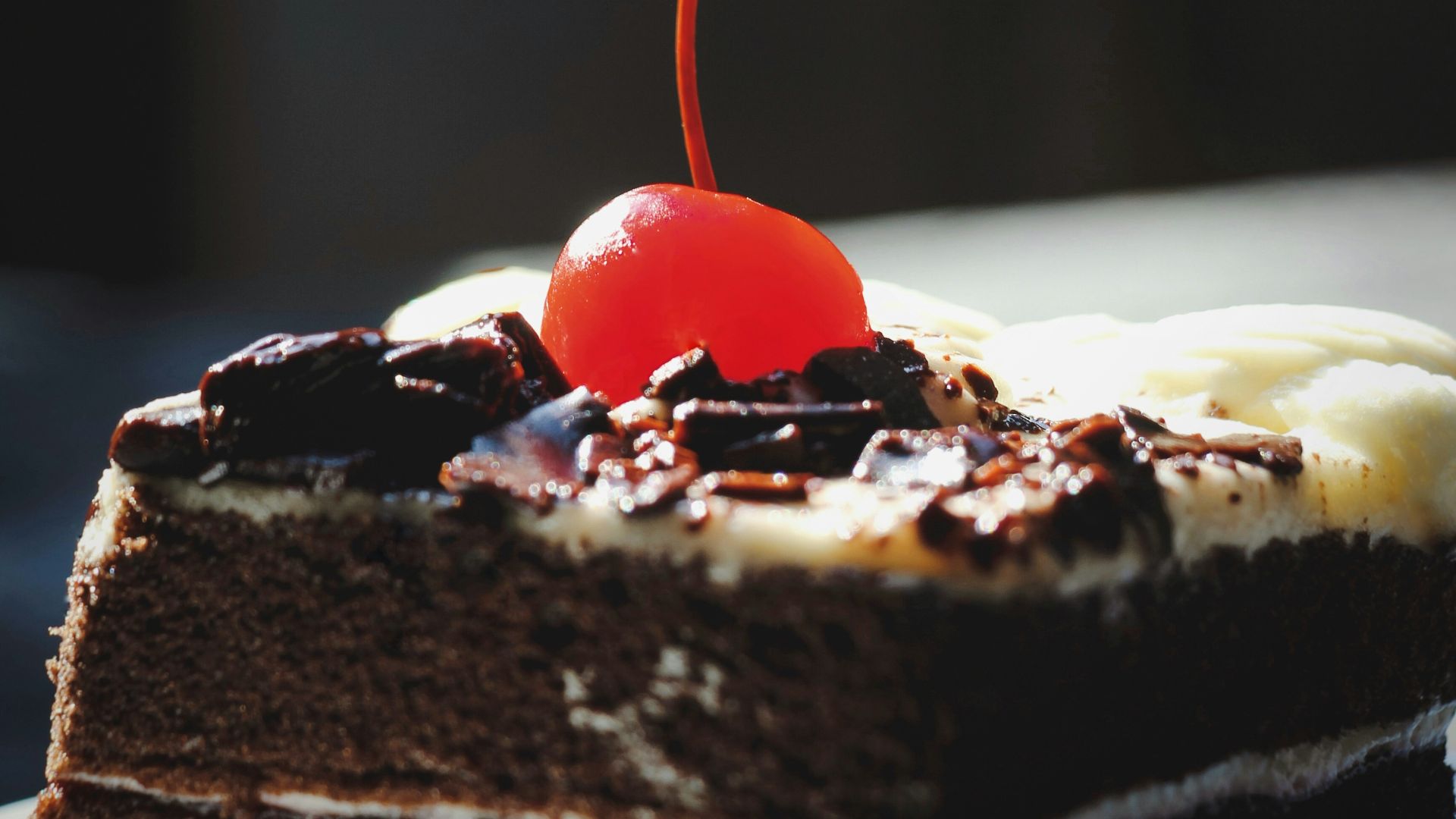 chocolate cake with cherry on top